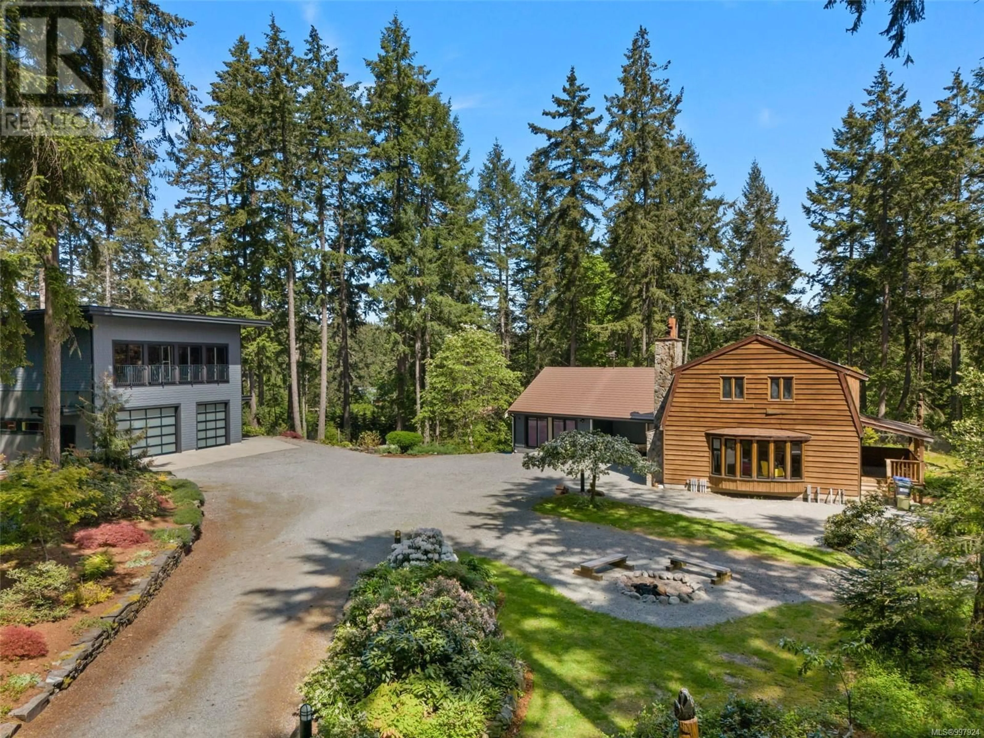 A pic from outside/outdoor area/front of a property/back of a property/a pic from drone, forest/trees view for 3281 MCGUIRE WAY, Nanaimo British Columbia V9G1C4