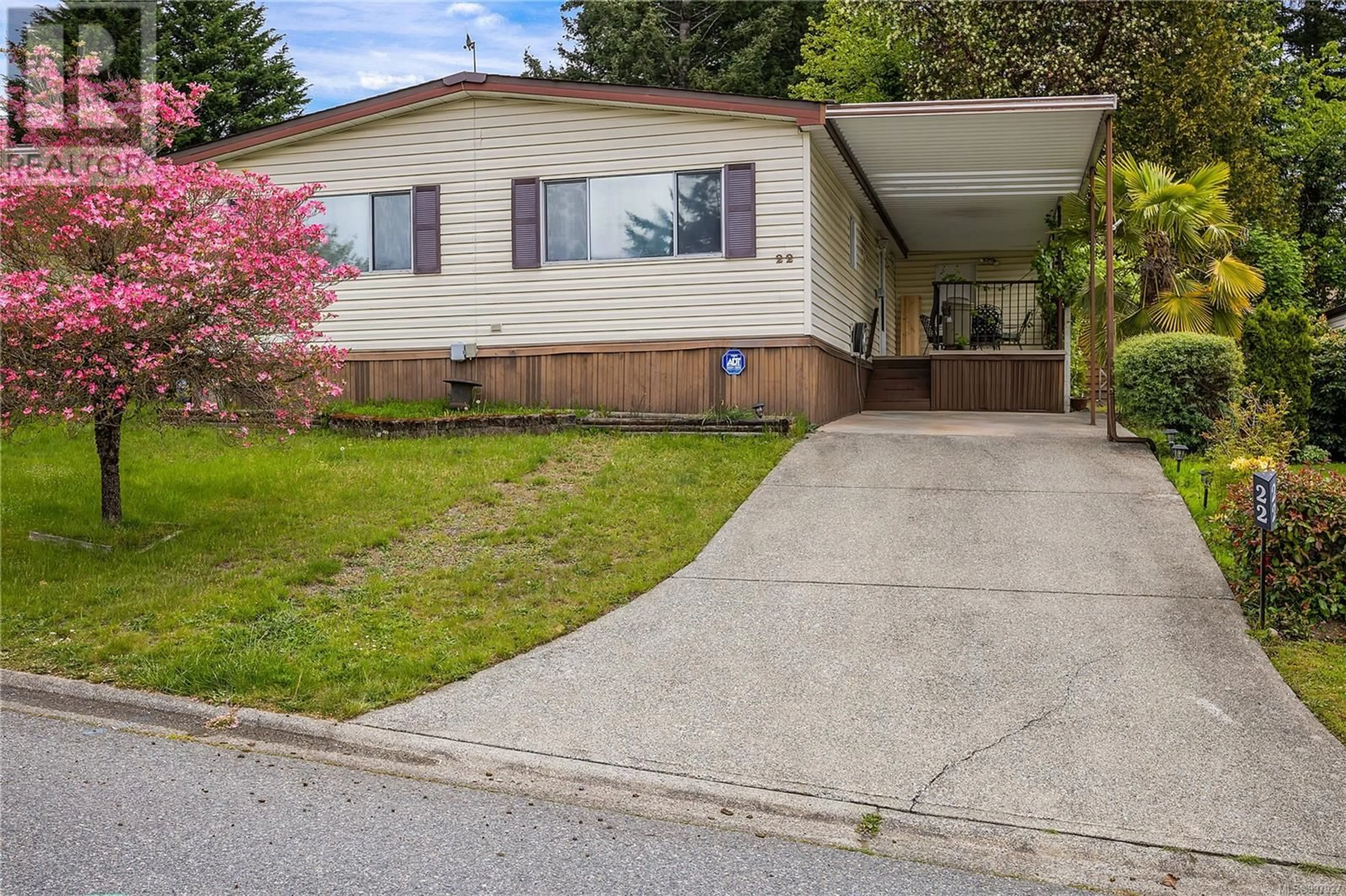 Home with vinyl exterior material, street for 22 - 2501 LABIEUX ROAD, Nanaimo British Columbia V9T5X3