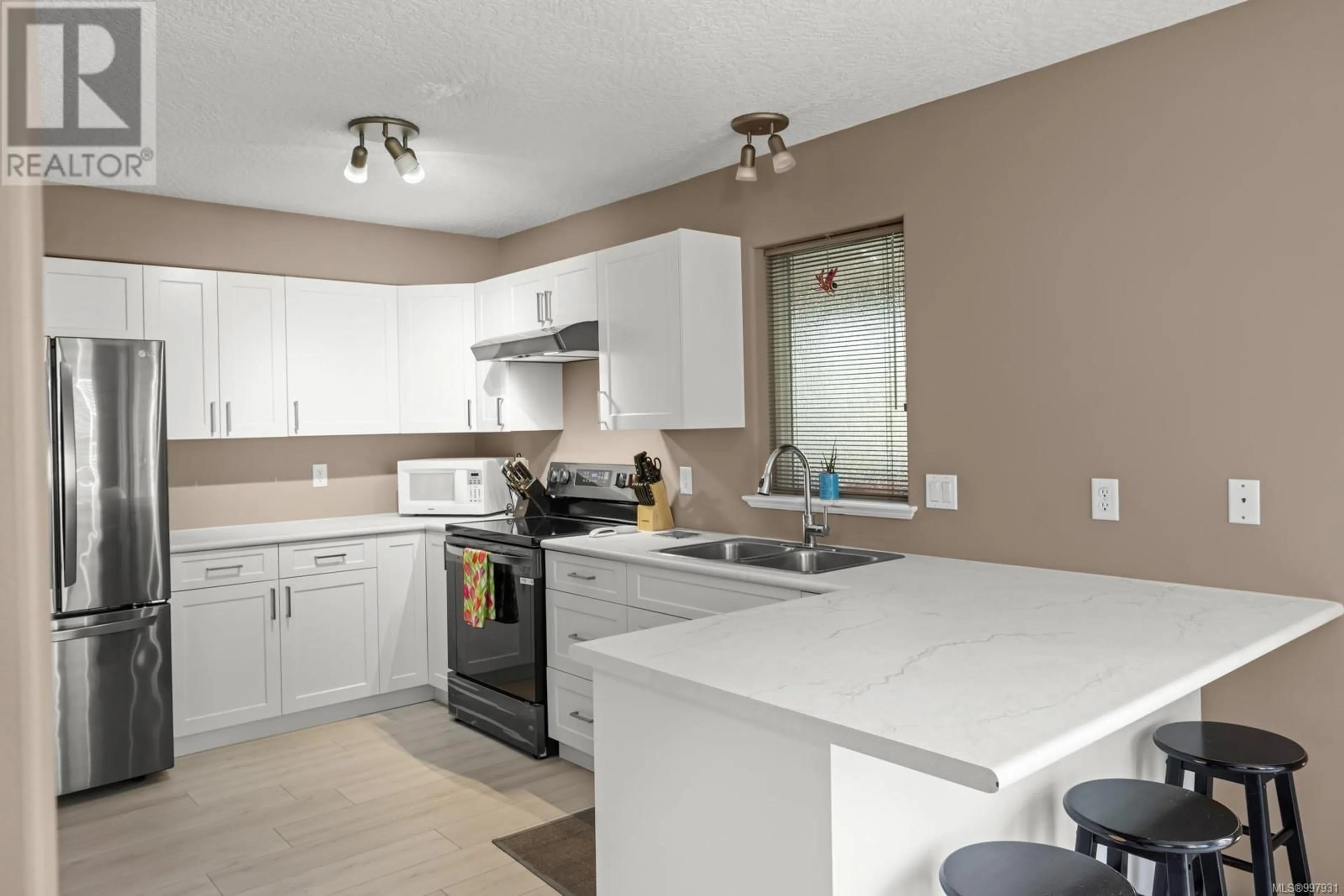 Open concept kitchen, ceramic/tile floor for 19 - 2711 JACKLIN ROAD, Langford British Columbia V9B3X7