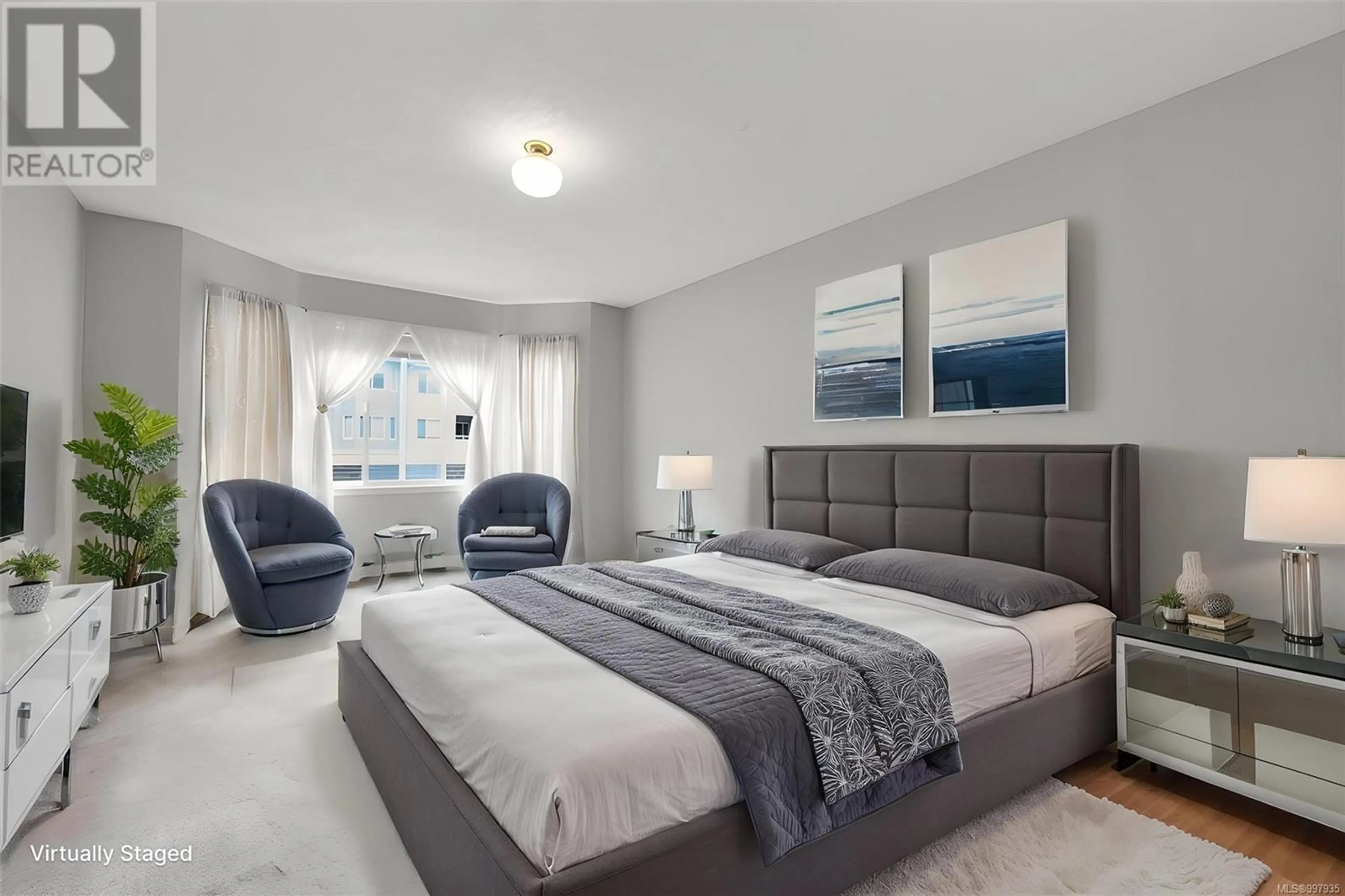 Bedroom with bed, unknown for 211 - 3921 SHELBOURNE STREET, Saanich British Columbia V8P4H9