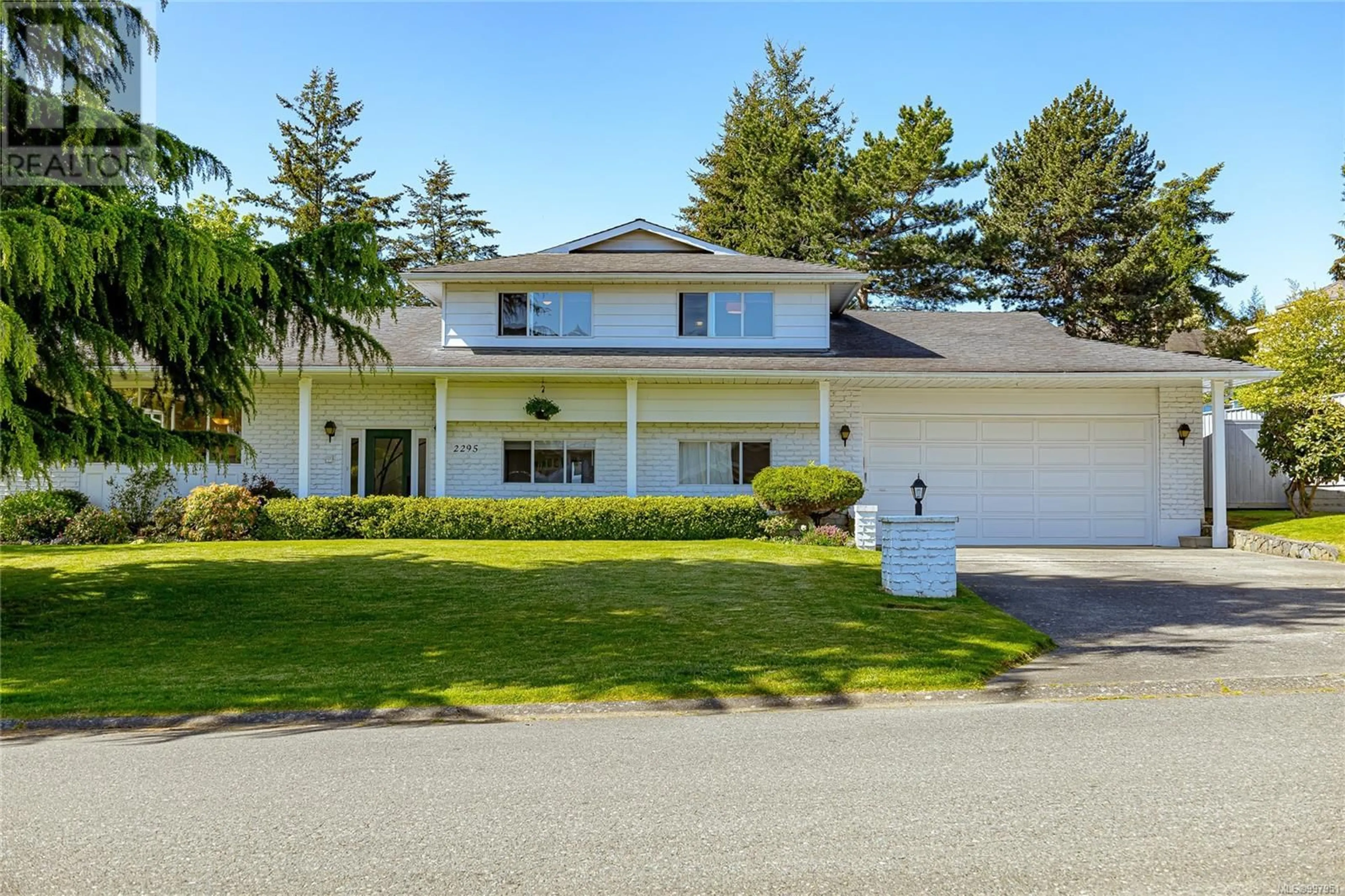 Home with vinyl exterior material, street for 2295 GREENLANDS ROAD, Saanich British Columbia V8N5B9