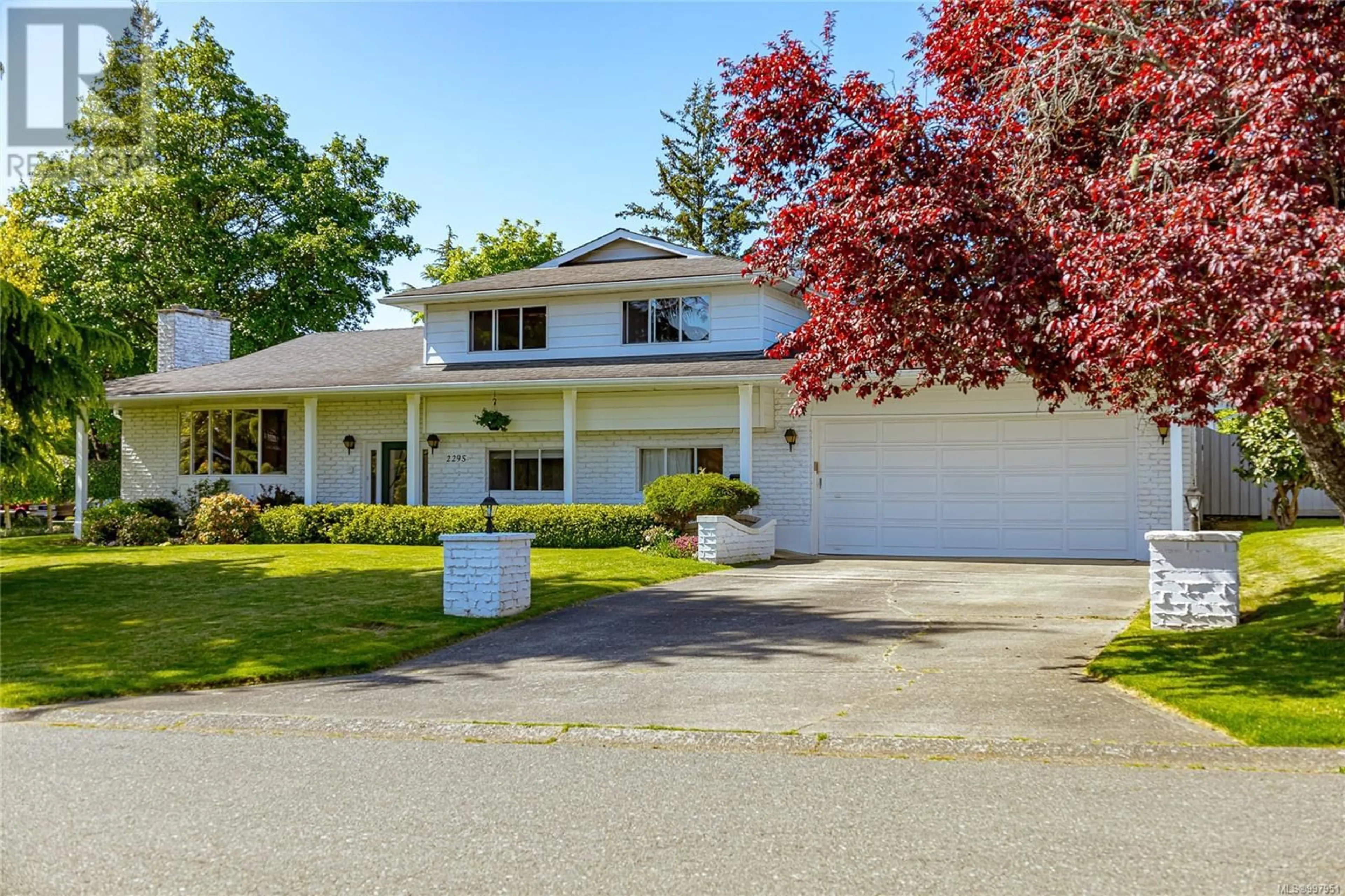 Home with vinyl exterior material, street for 2295 GREENLANDS ROAD, Saanich British Columbia V8N5B9