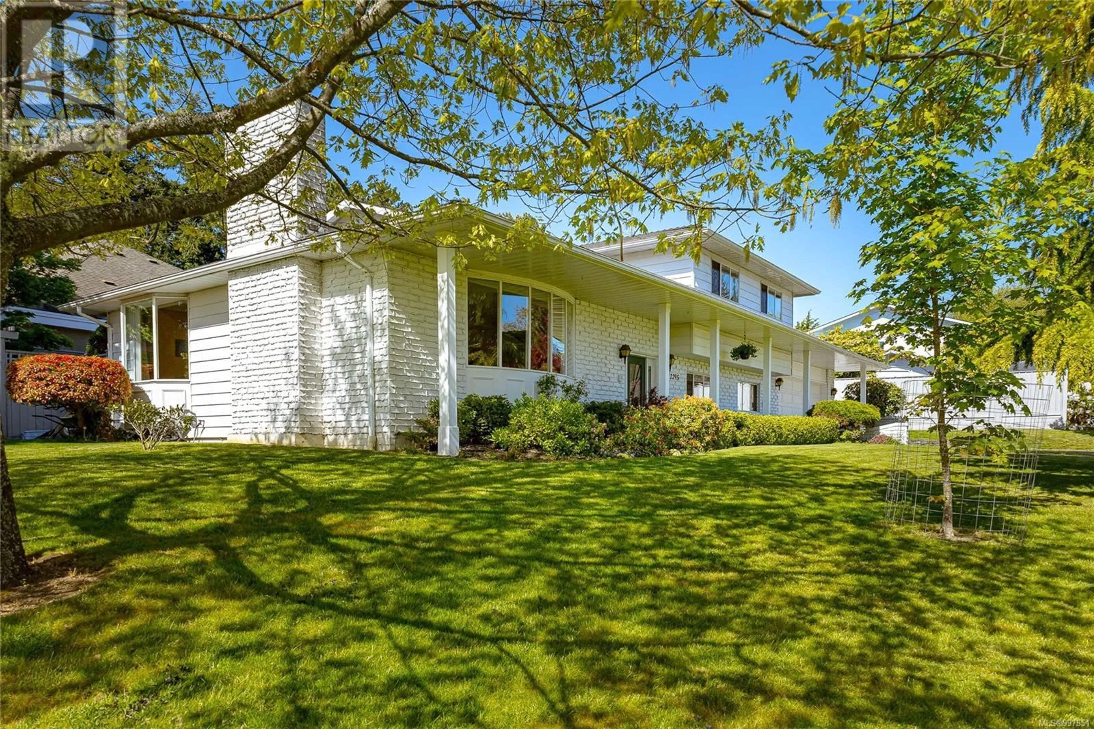 Home with vinyl exterior material, street for 2295 GREENLANDS ROAD, Saanich British Columbia V8N5B9