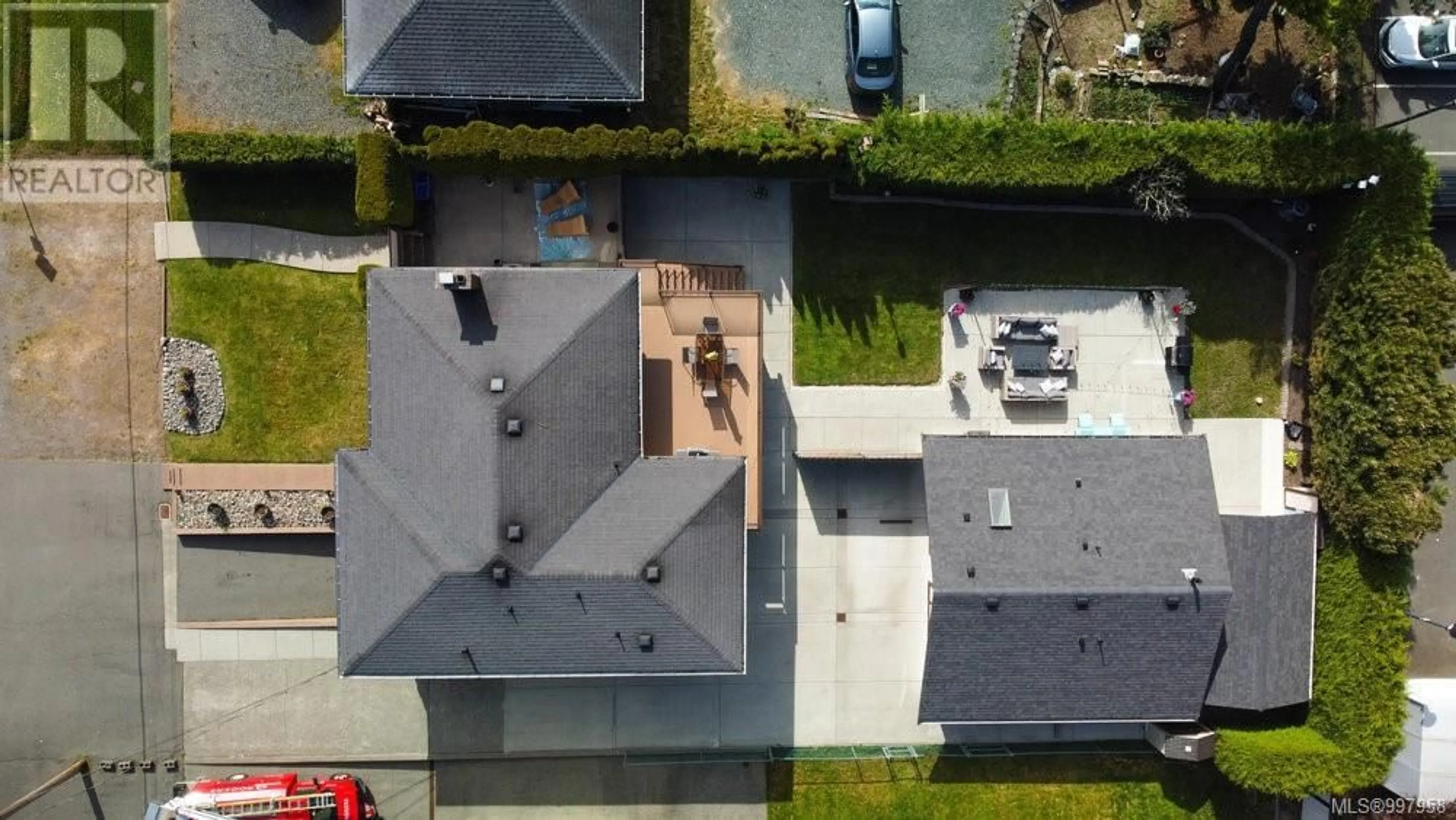 A pic from outside/outdoor area/front of a property/back of a property/a pic from drone, street for 1670 GARNET ROAD, Saanich British Columbia V8P3C8