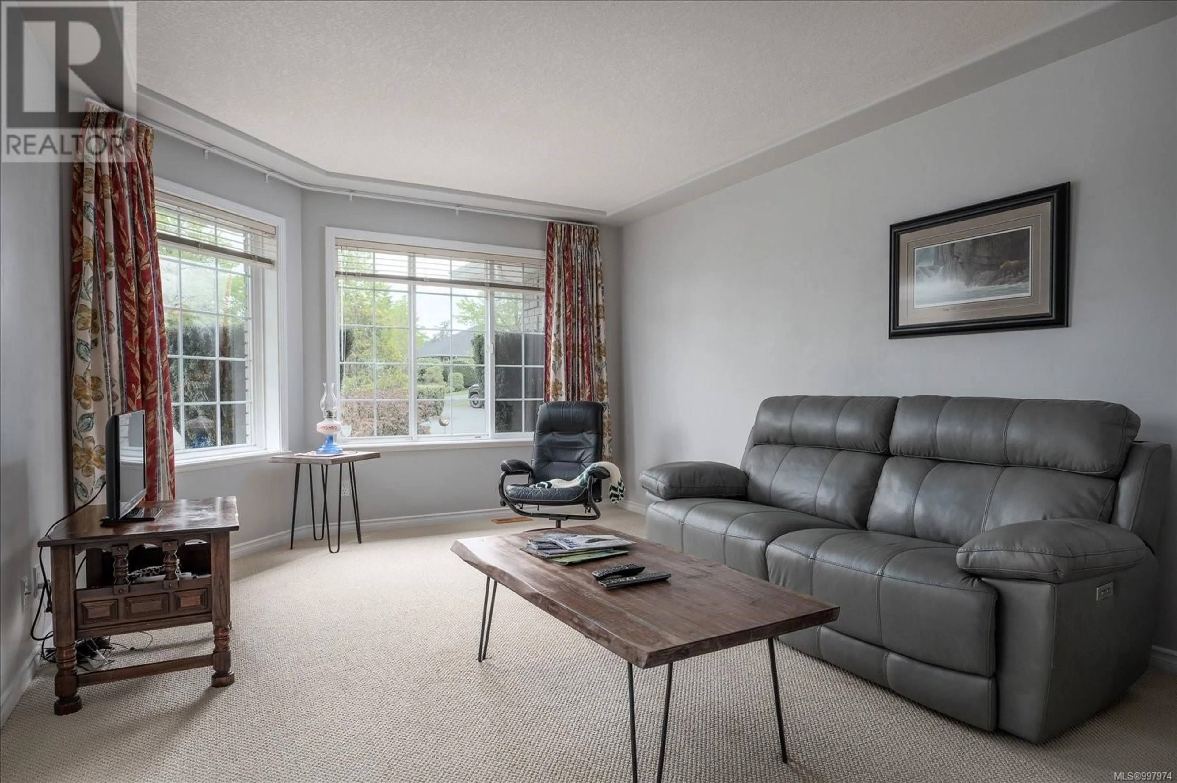 Living room with furniture, unknown for 600 HICKORY PLACE, Qualicum Beach British Columbia V9K2S1