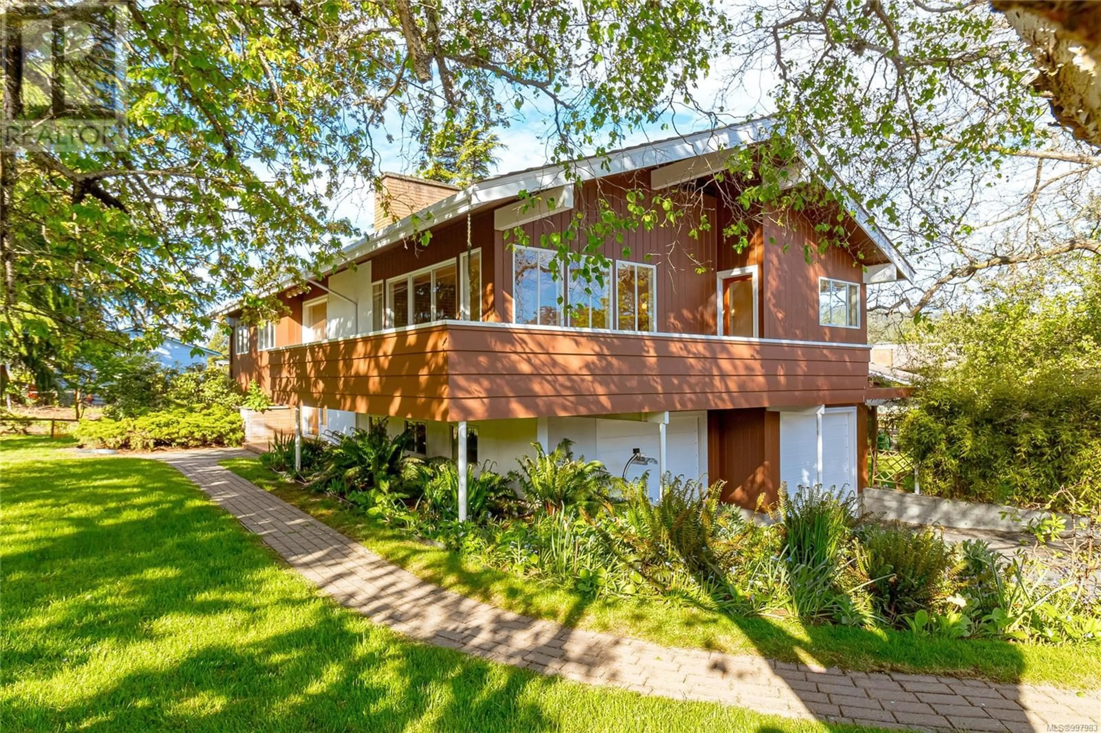 Home with brick exterior material, street for 1601 MILEVA LANE, Saanich British Columbia V8N2V6