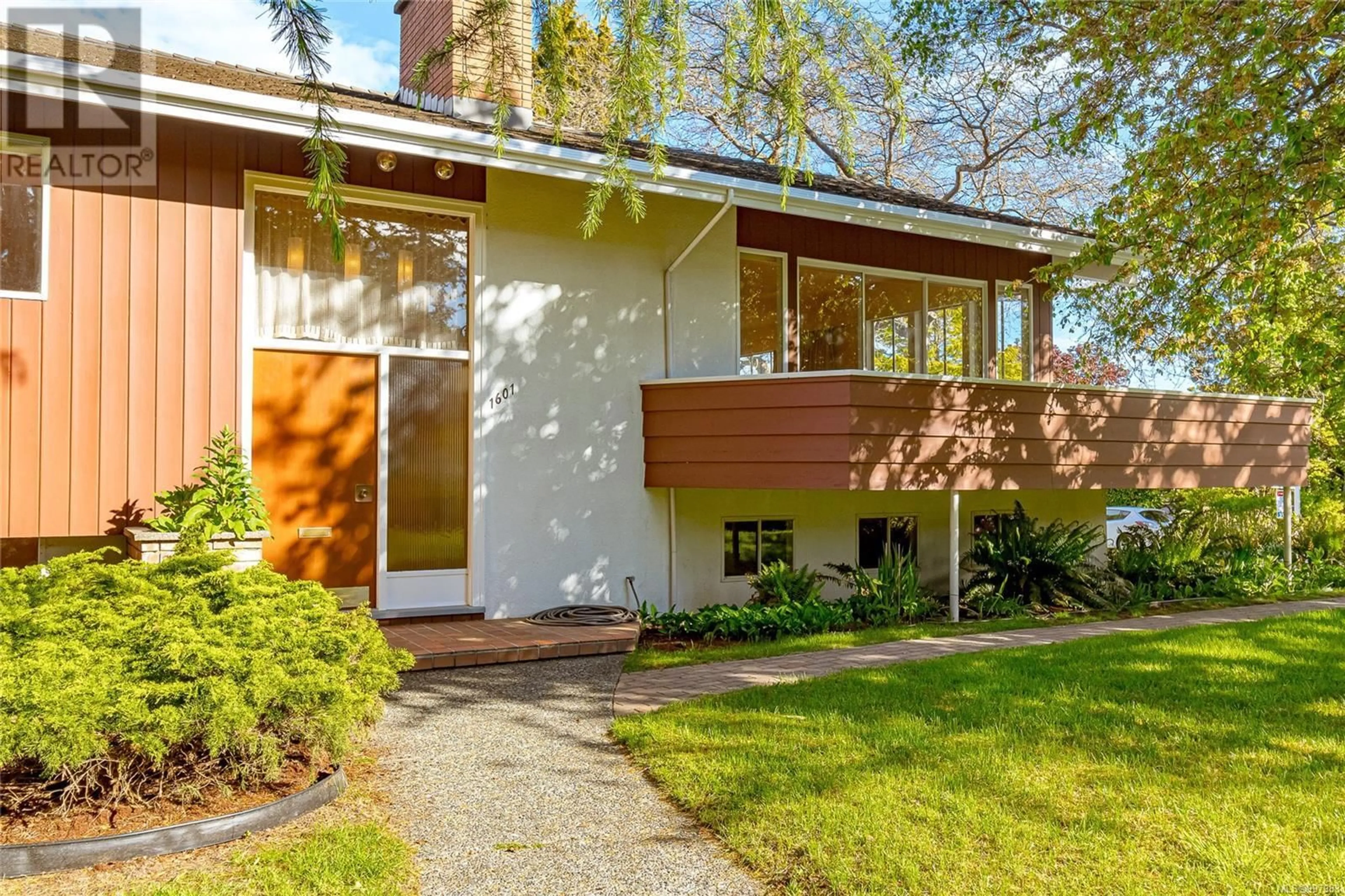 Home with vinyl exterior material, street for 1601 MILEVA LANE, Saanich British Columbia V8N2V6