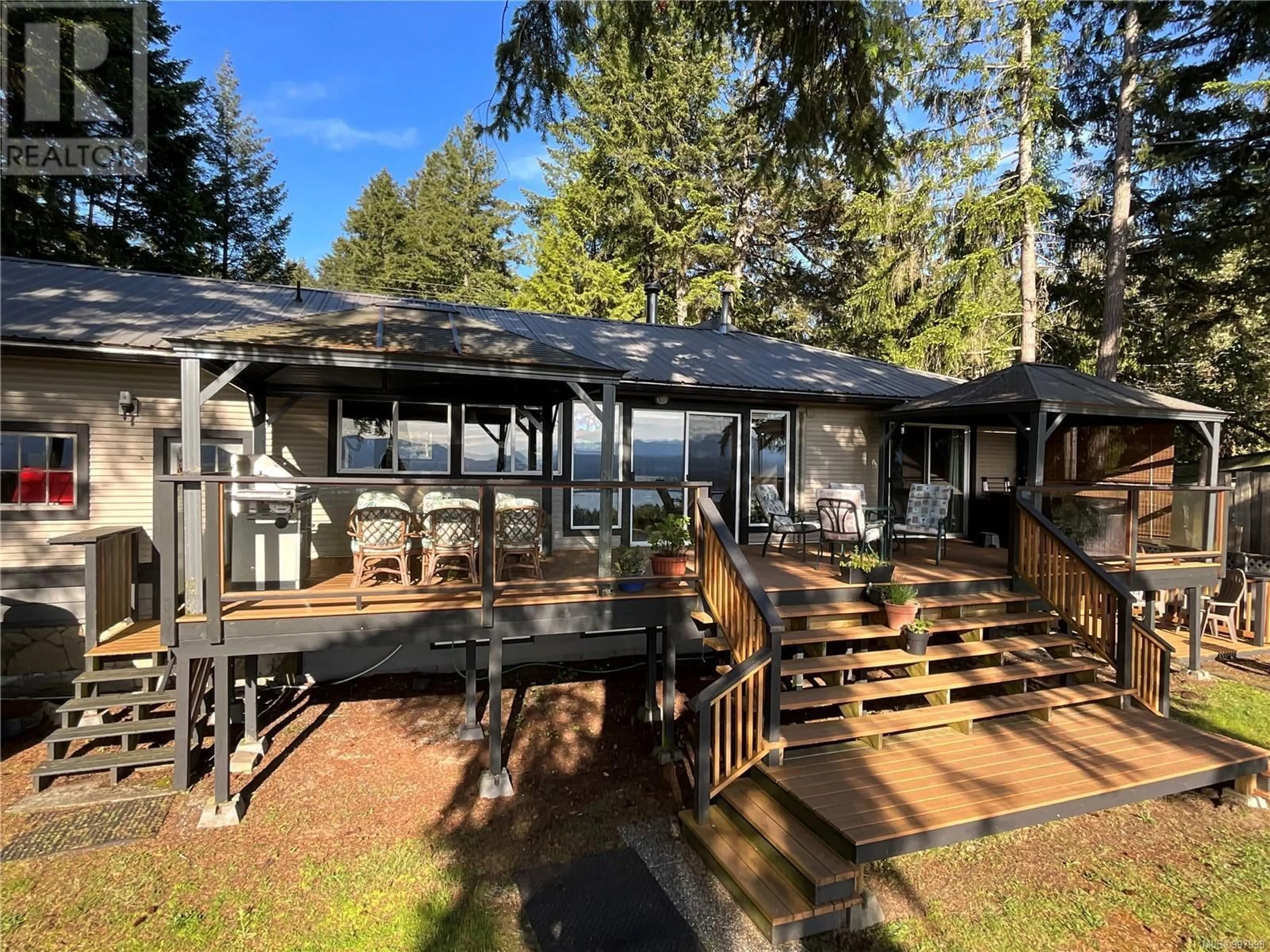 A pic from outside/outdoor area/front of a property/back of a property/a pic from drone, water/lake/river/ocean view for 1017 PAT BURNS AVENUE, Gabriola Island British Columbia V0R1X2