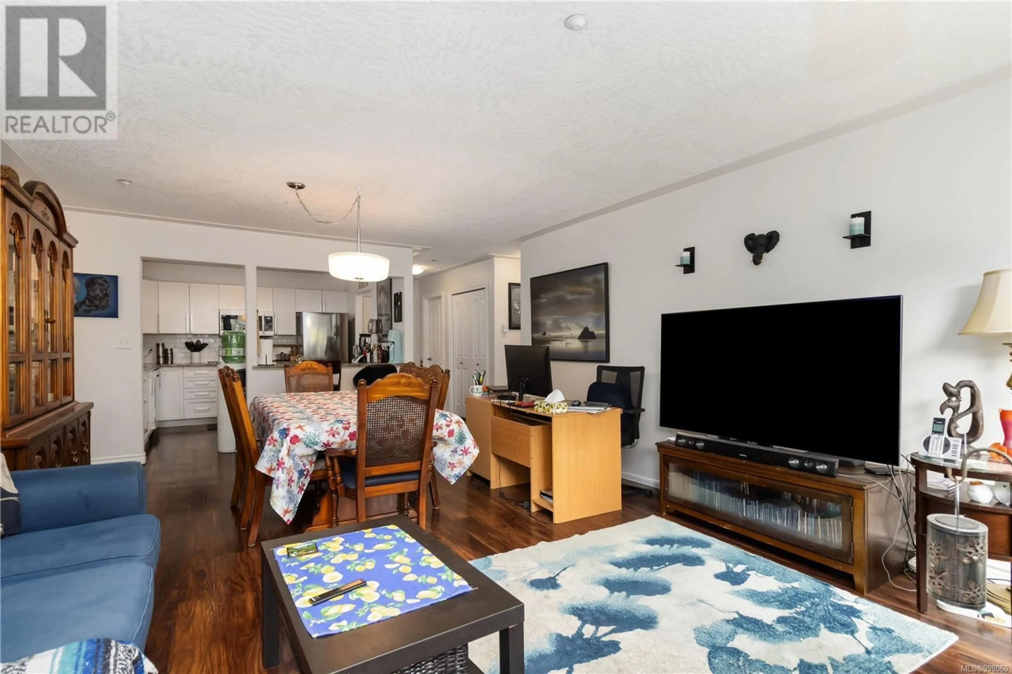Living room with furniture, wood/laminate floor for 309 - 606 GOLDSTREAM AVENUE, Langford British Columbia V9B2W8