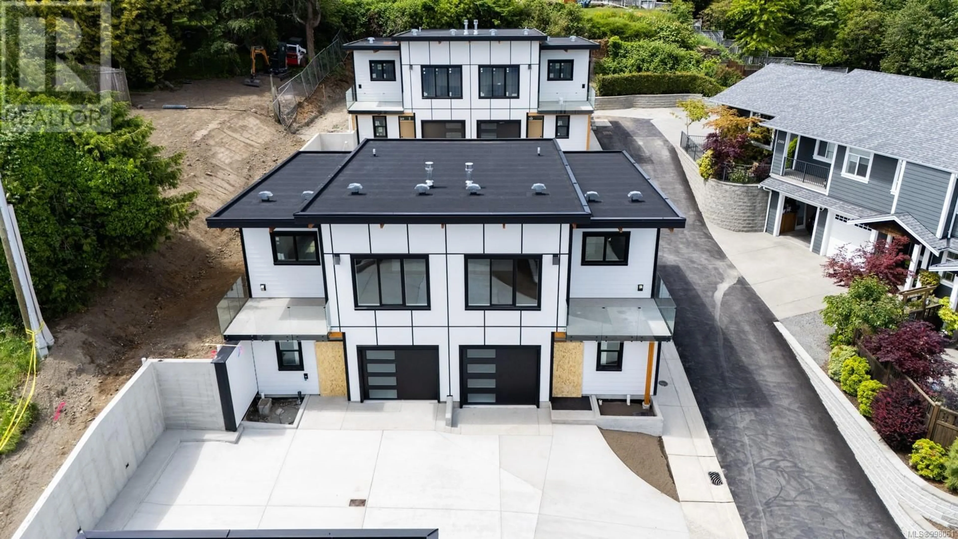 A pic from outside/outdoor area/front of a property/back of a property/a pic from drone, street for 2543 DOCTORS ROAD, Nanaimo British Columbia V9S3V4