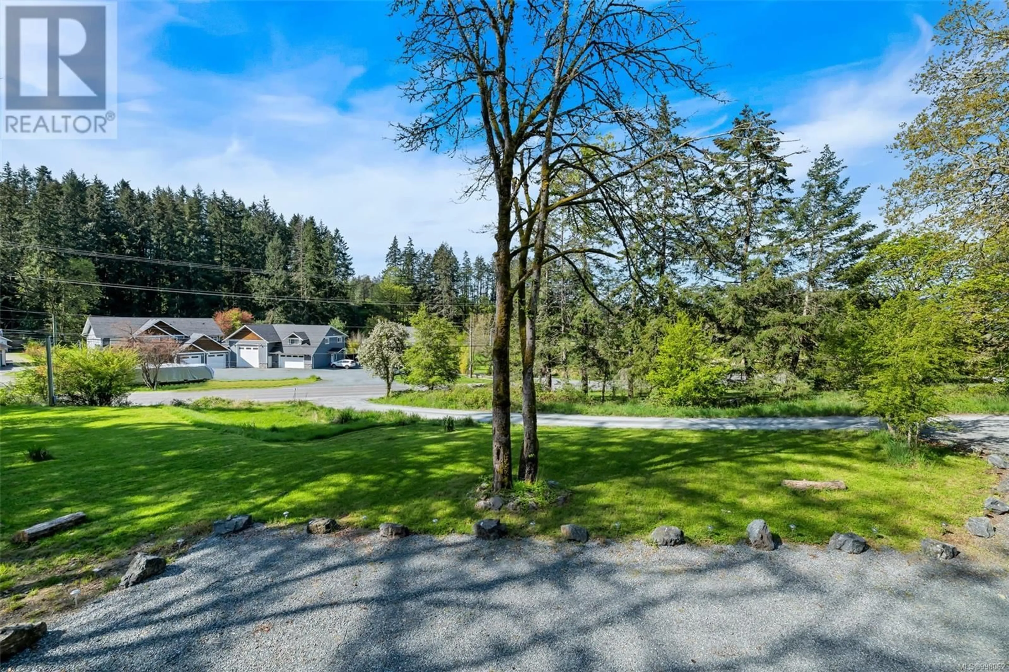 A pic from outside/outdoor area/front of a property/back of a property/a pic from drone, forest/trees view for 1029 HERD ROAD, Duncan British Columbia V9L5W9