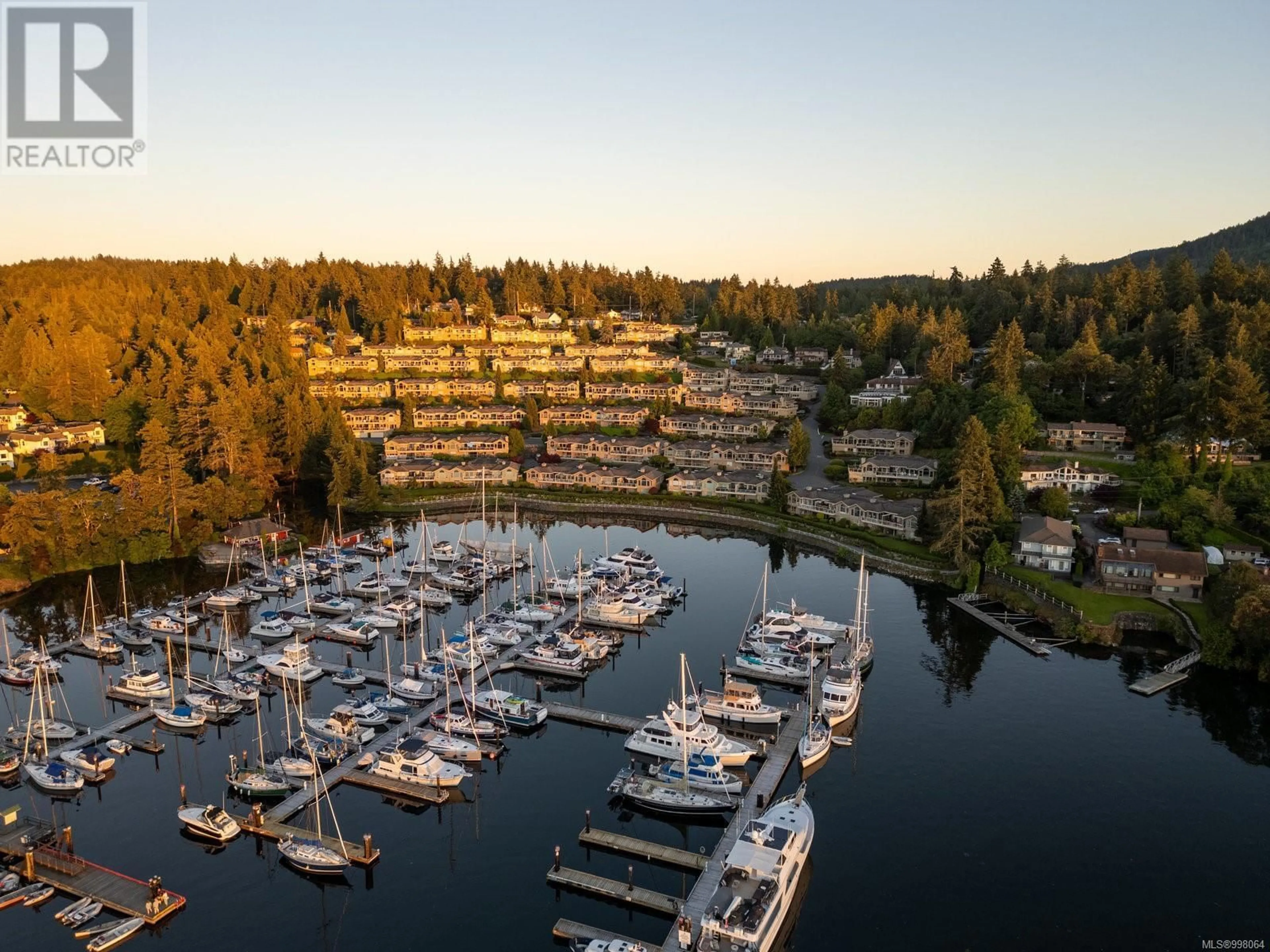 A pic from outside/outdoor area/front of a property/back of a property/a pic from drone, water/lake/river/ocean view for 927 - 6880 WALLACE DRIVE, Central Saanich British Columbia V8M1N8