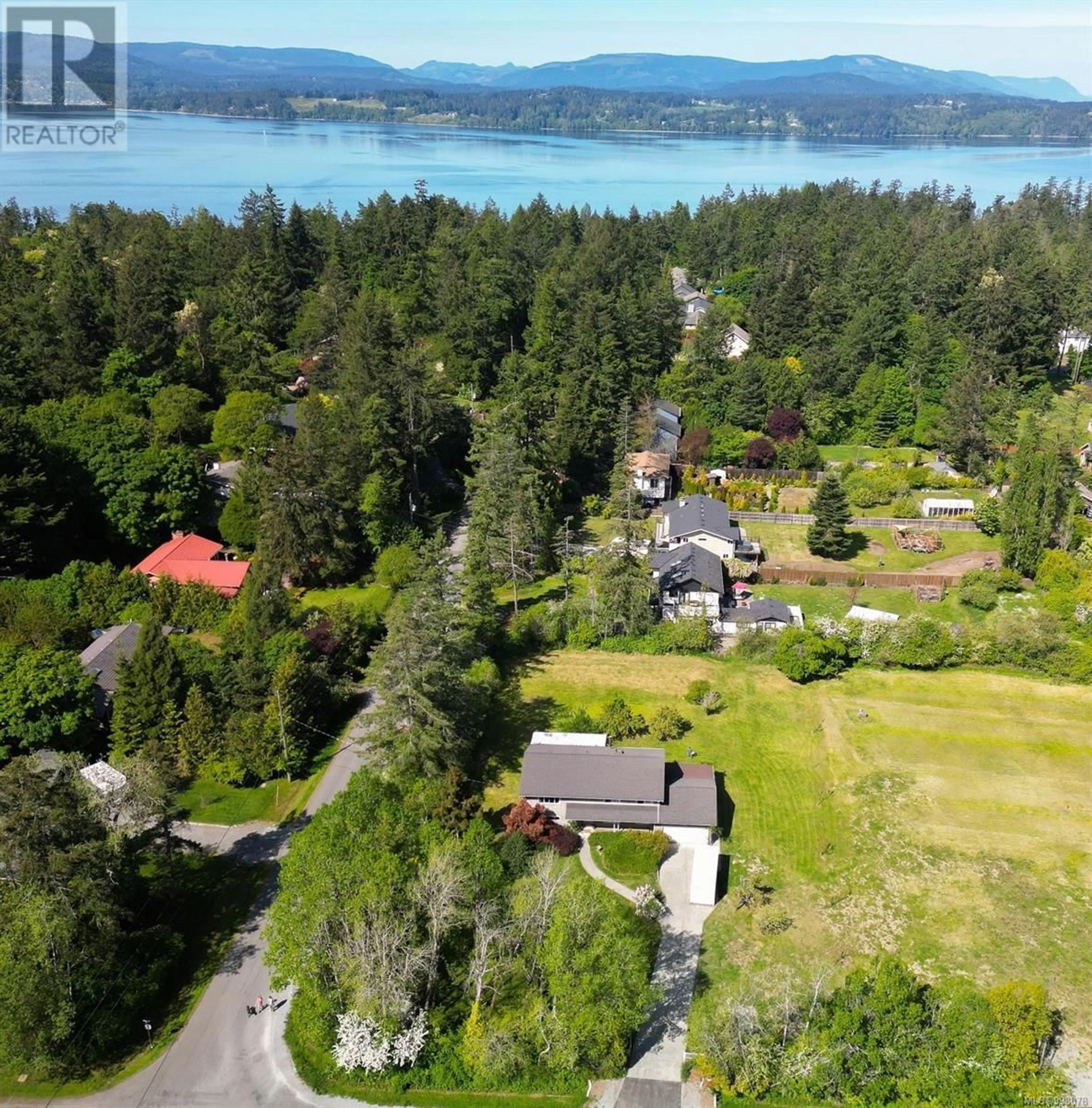 A pic from outside/outdoor area/front of a property/back of a property/a pic from drone, water/lake/river/ocean view for 10814 DERRICK ROAD, North Saanich British Columbia V8L5M5