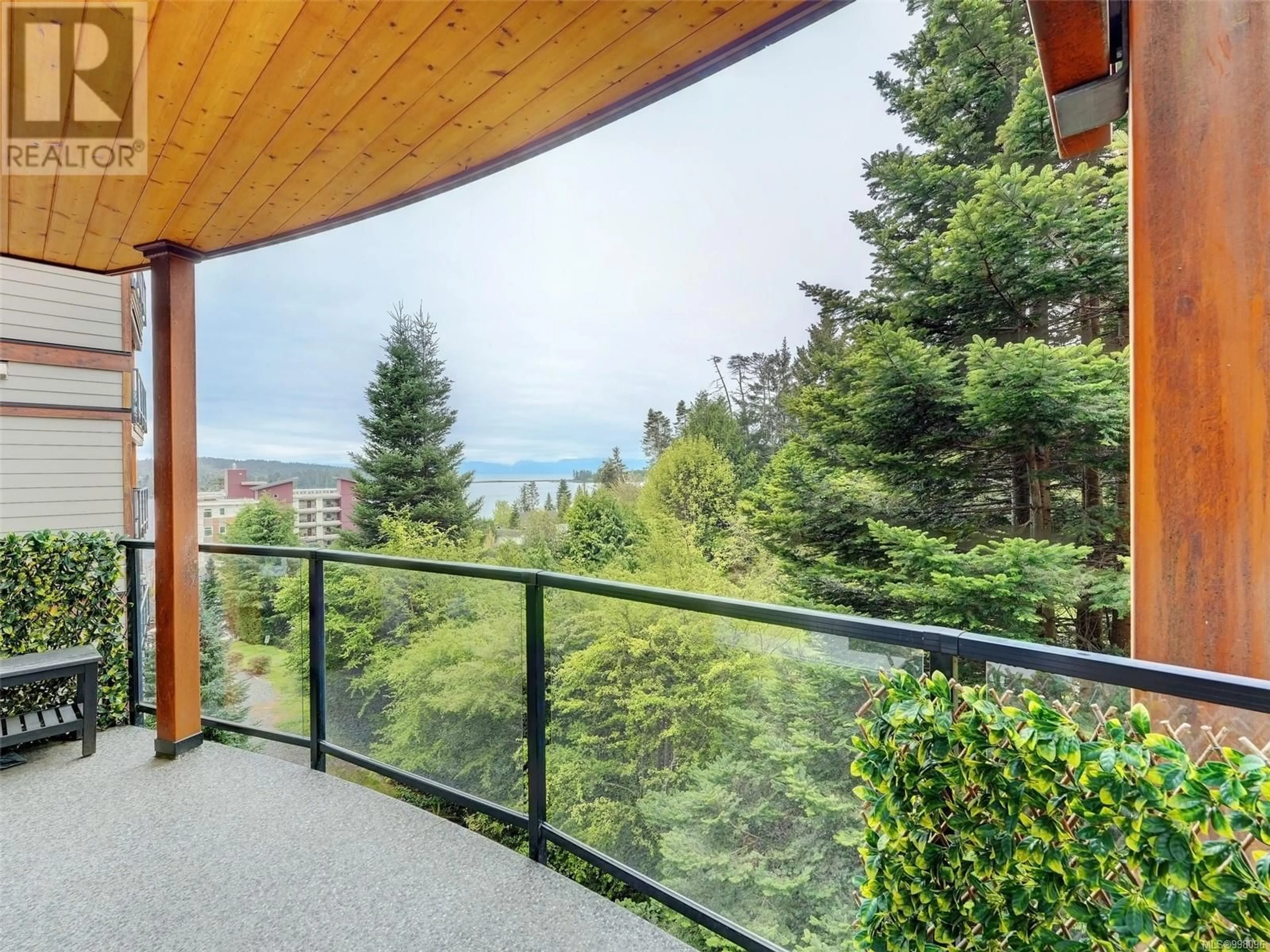 Balcony in the apartment, forest/trees view for 305 - 6591 LINCROFT ROAD, Sooke British Columbia V9Z1M2