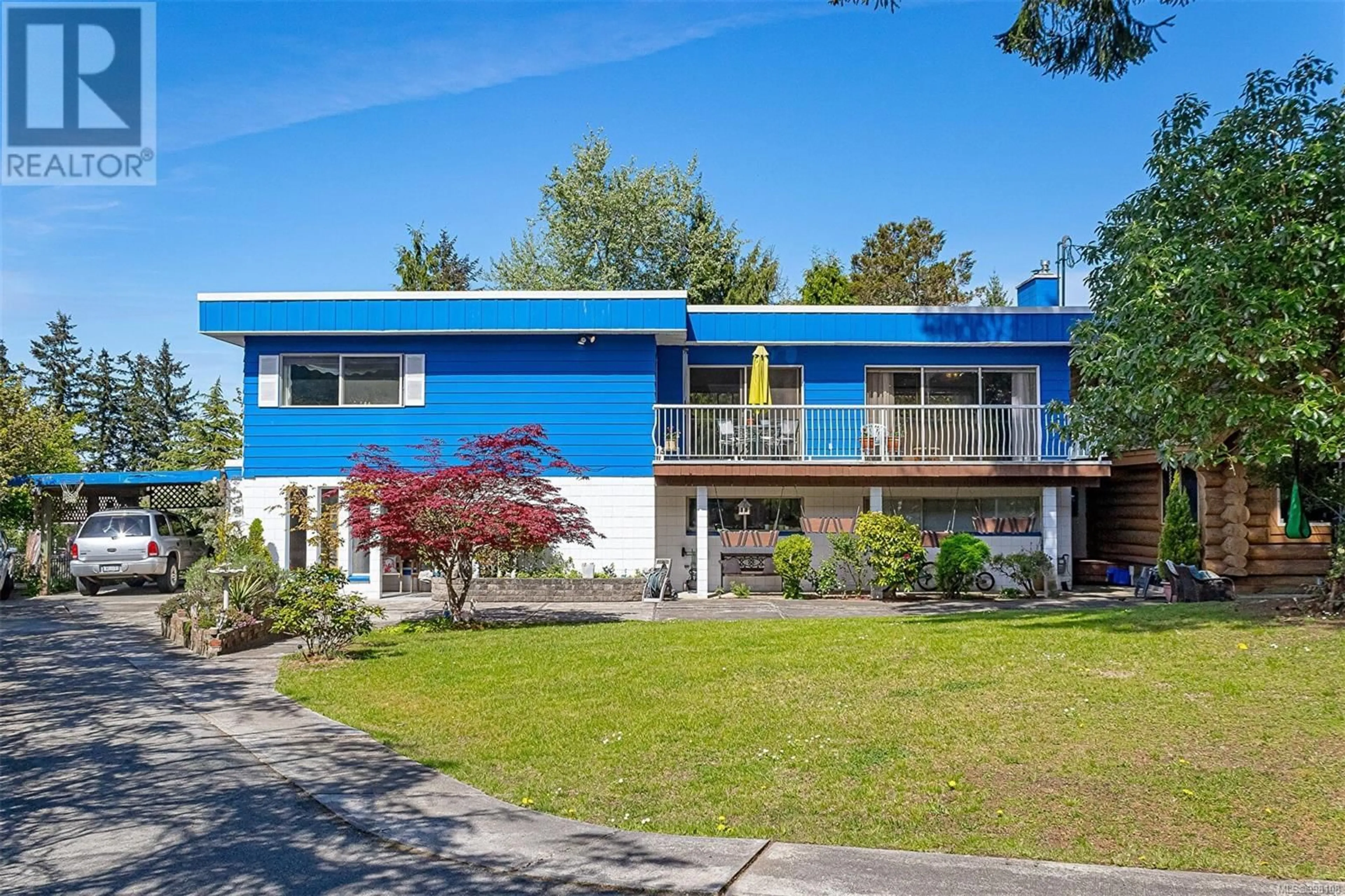 Home with vinyl exterior material, street for 2374 MILL ROAD, Nanaimo British Columbia V9R6S9