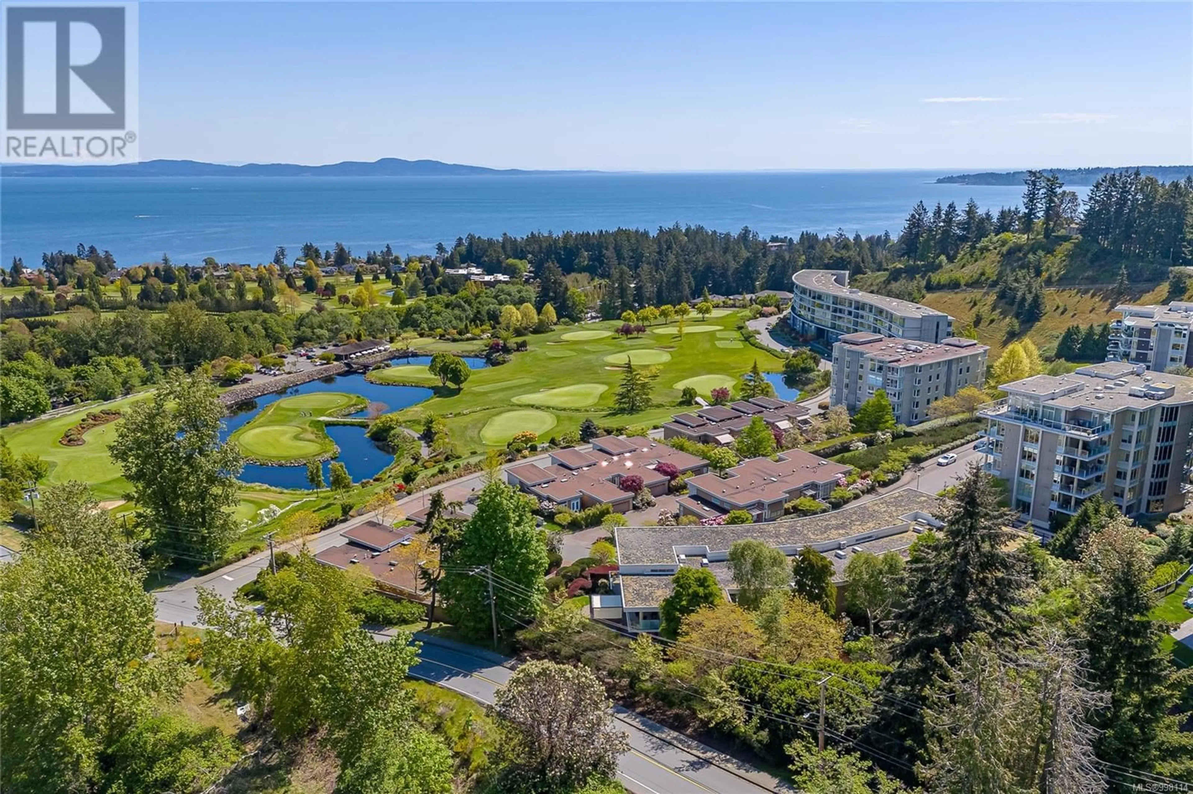 A pic from outside/outdoor area/front of a property/back of a property/a pic from drone, water/lake/river/ocean view for 203 - 758 SAYWARD HILL TERRACE, Saanich British Columbia V8Y3K1