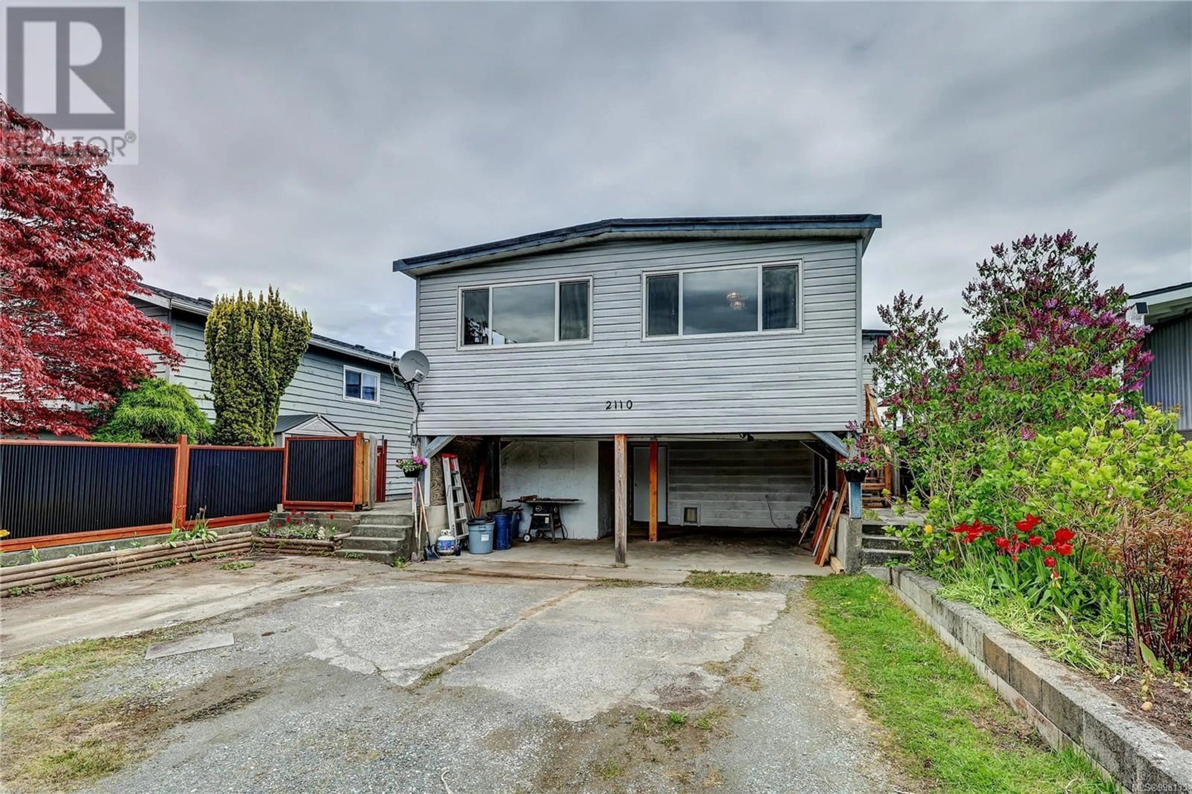 A pic from outside/outdoor area/front of a property/back of a property/a pic from drone, street for 2110 CHELAN CRESCENT, Port McNeill British Columbia V0N2R0