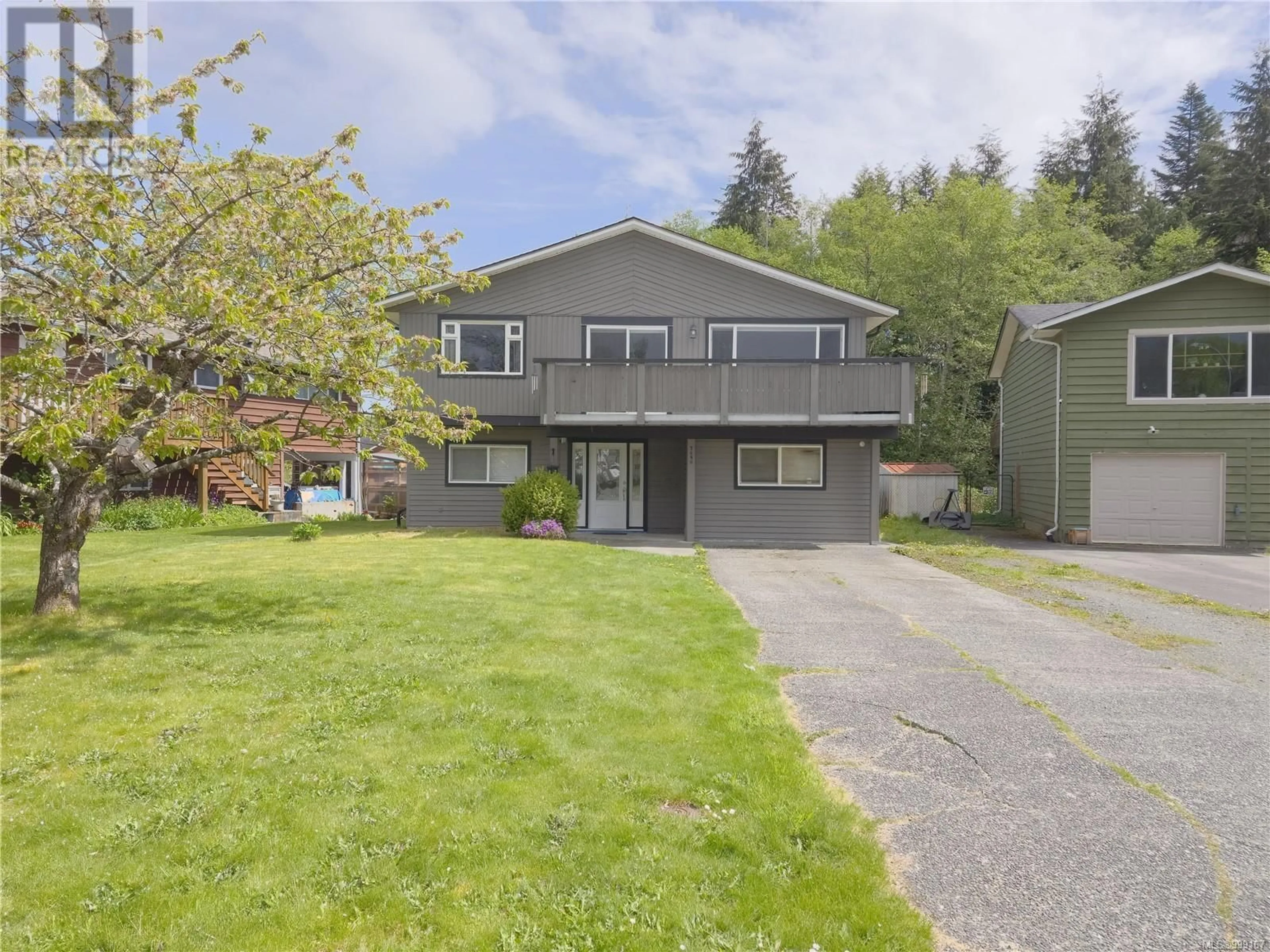 Home with vinyl exterior material, street for 7490 CADWALLADER CRESCENT, Port Hardy British Columbia V0N2P0