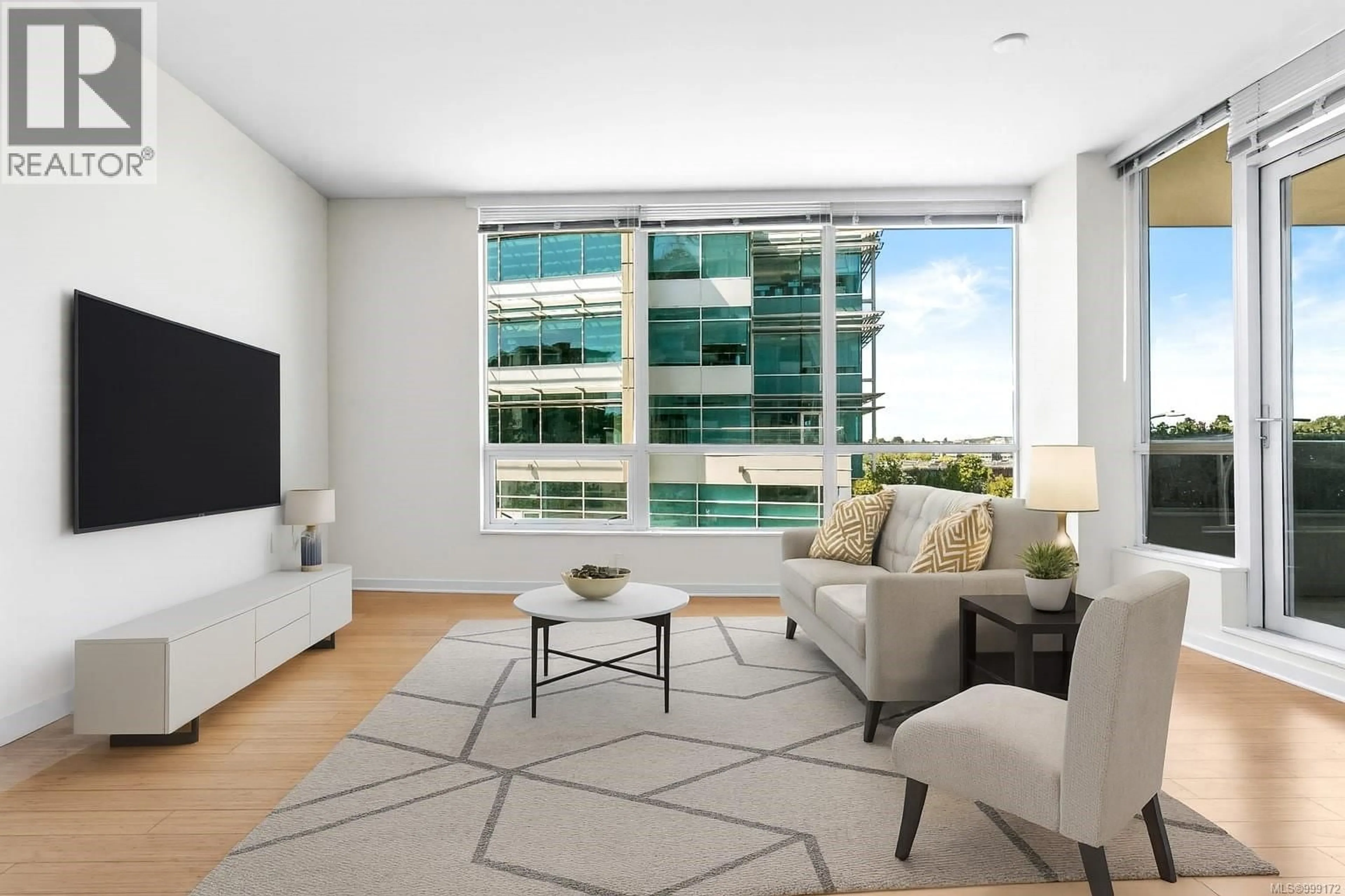 Living room with furniture, unknown for 305 - 399 TYEE ROAD, Victoria British Columbia V9A0A8