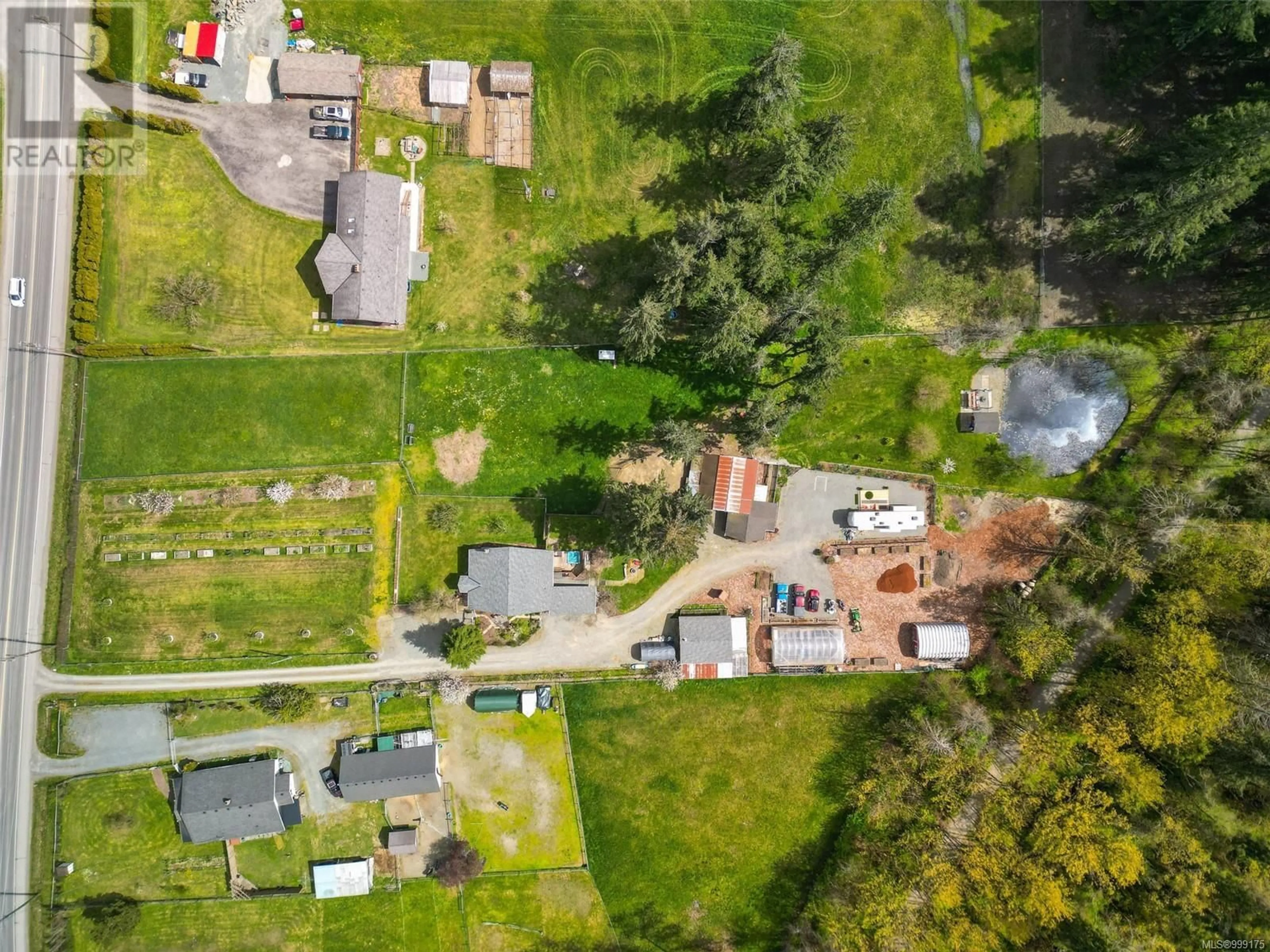 A pic from outside/outdoor area/front of a property/back of a property/a pic from drone, street for 3574 COWICHAN LAKE ROAD, Duncan British Columbia V9L6K5