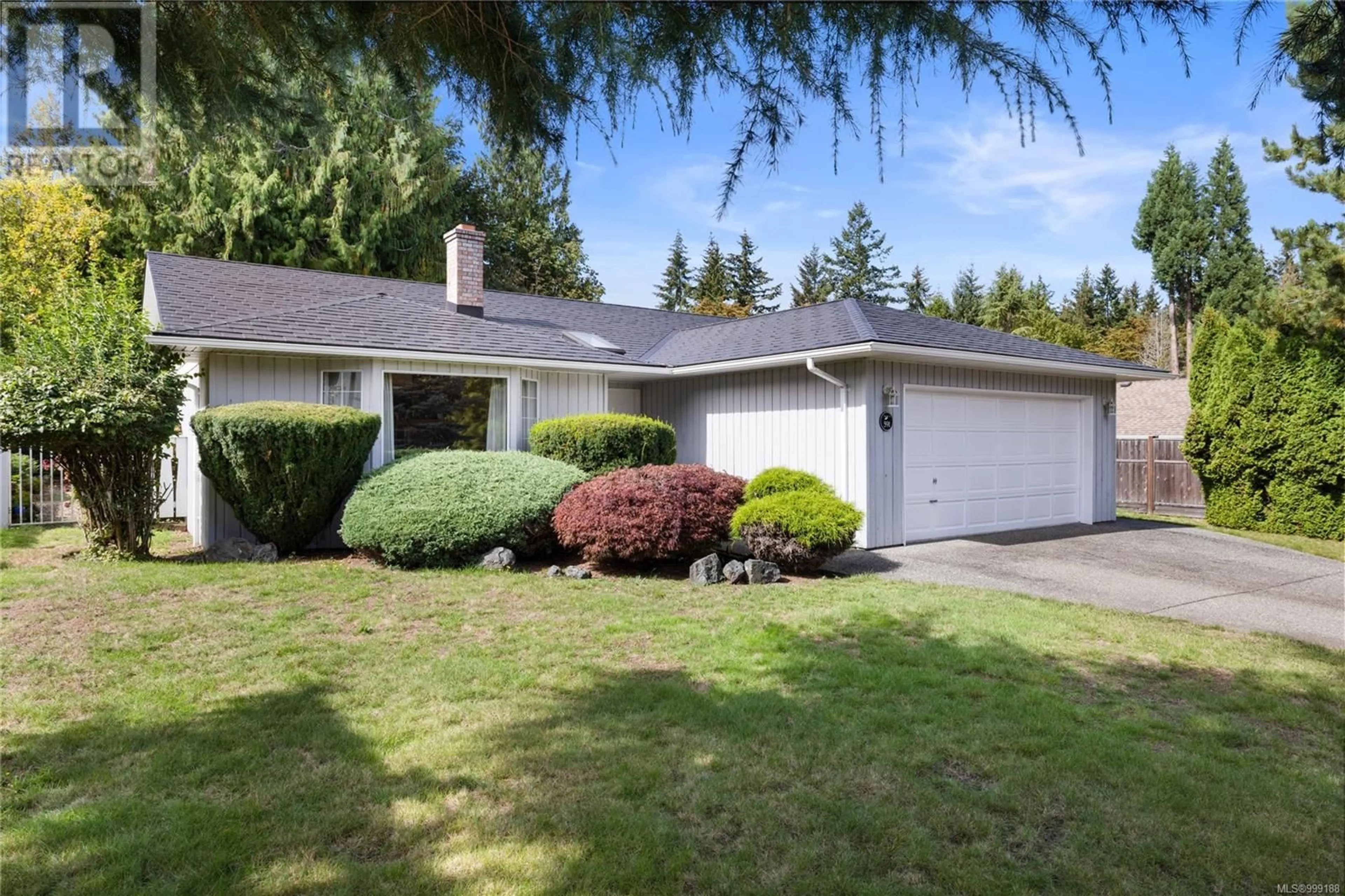 Home with vinyl exterior material, street for 591 MORESBY AVENUE, Qualicum Beach British Columbia V9K1J6