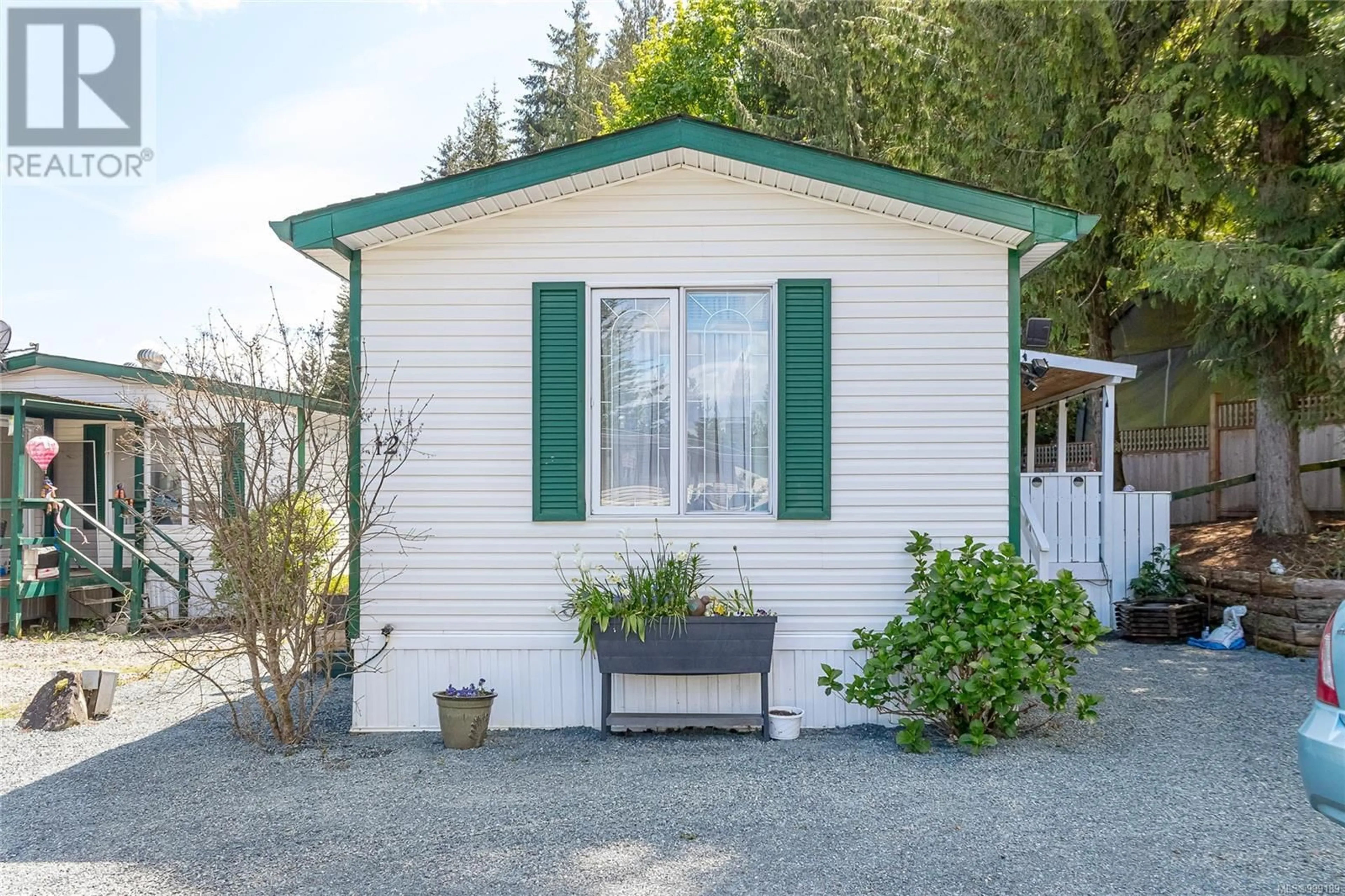 Home with vinyl exterior material, street for 12 - 3100 RINVOLD ROAD, Hilliers British Columbia V0R1M0