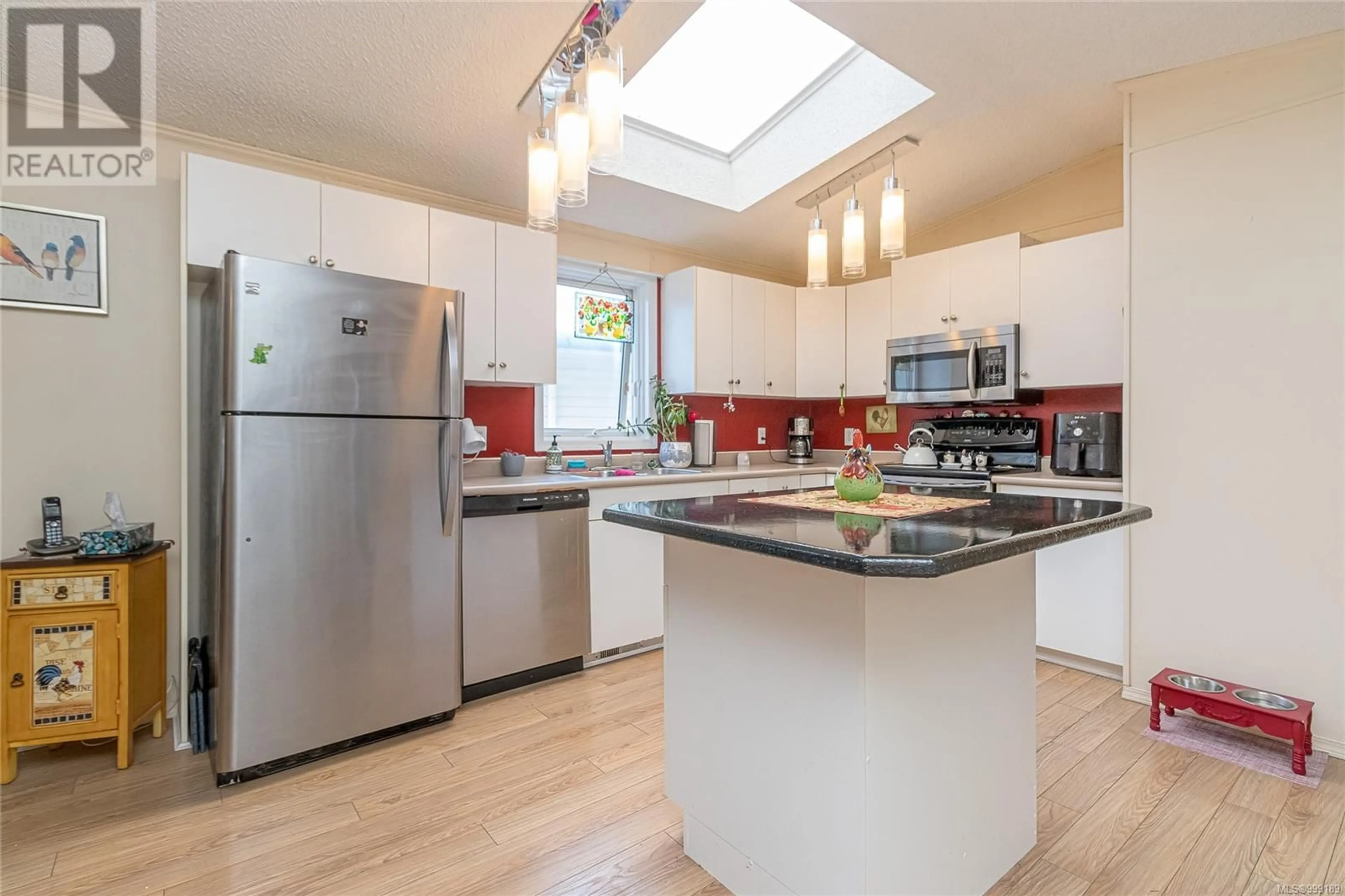 Open concept kitchen, unknown for 12 - 3100 RINVOLD ROAD, Hilliers British Columbia V0R1M0