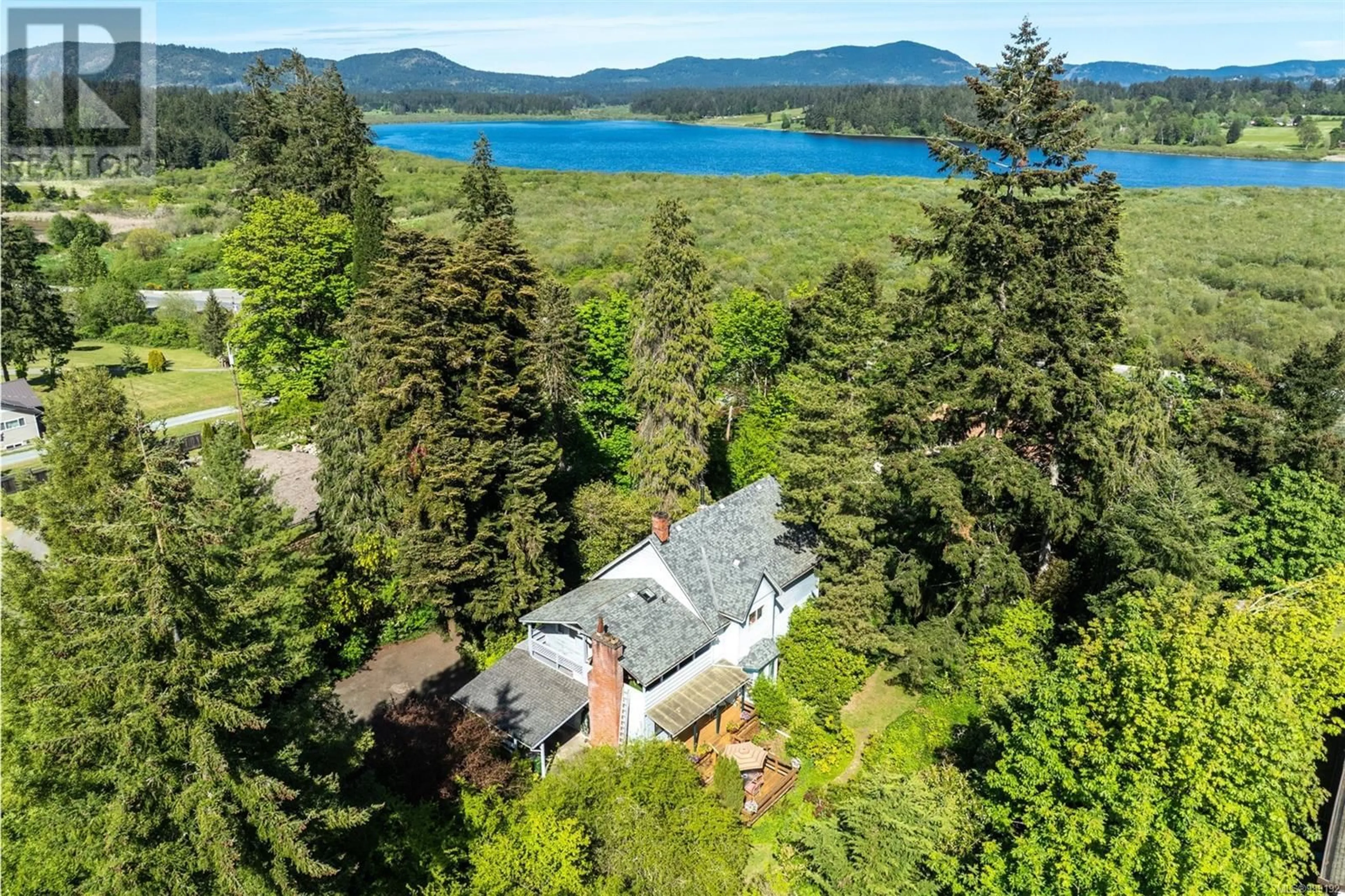 A pic from outside/outdoor area/front of a property/back of a property/a pic from drone, water/lake/river/ocean view for 6184 ALINGTON ROAD, Duncan British Columbia V9L2E9