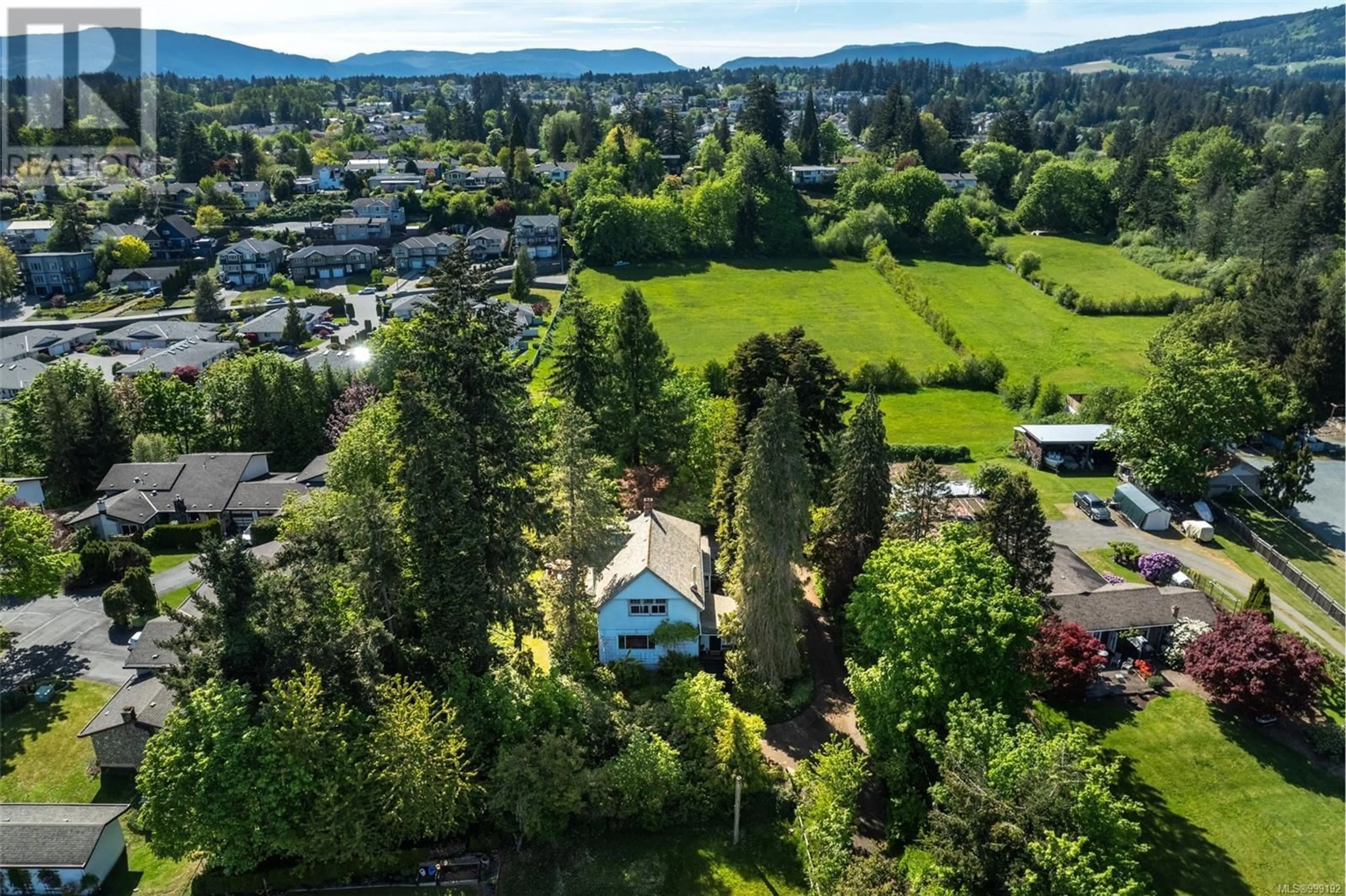 A pic from outside/outdoor area/front of a property/back of a property/a pic from drone, mountain view for 6184 ALINGTON ROAD, Duncan British Columbia V9L2E9