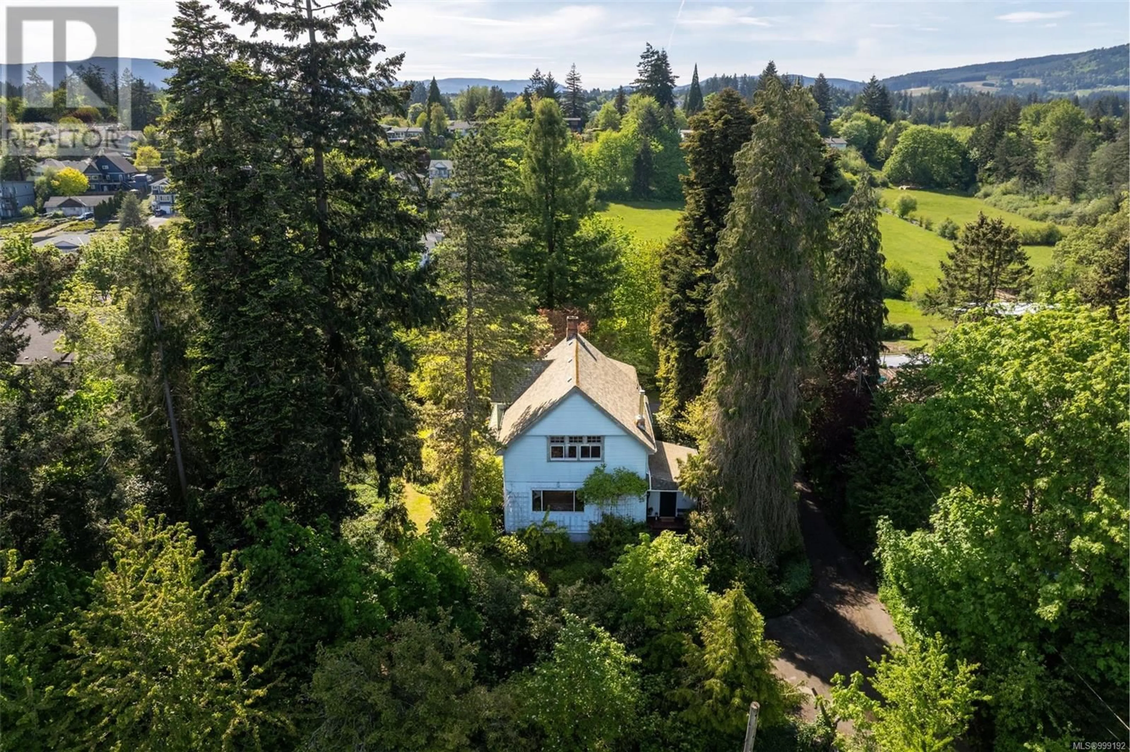A pic from outside/outdoor area/front of a property/back of a property/a pic from drone, forest/trees view for 6184 ALINGTON ROAD, Duncan British Columbia V9L2E9