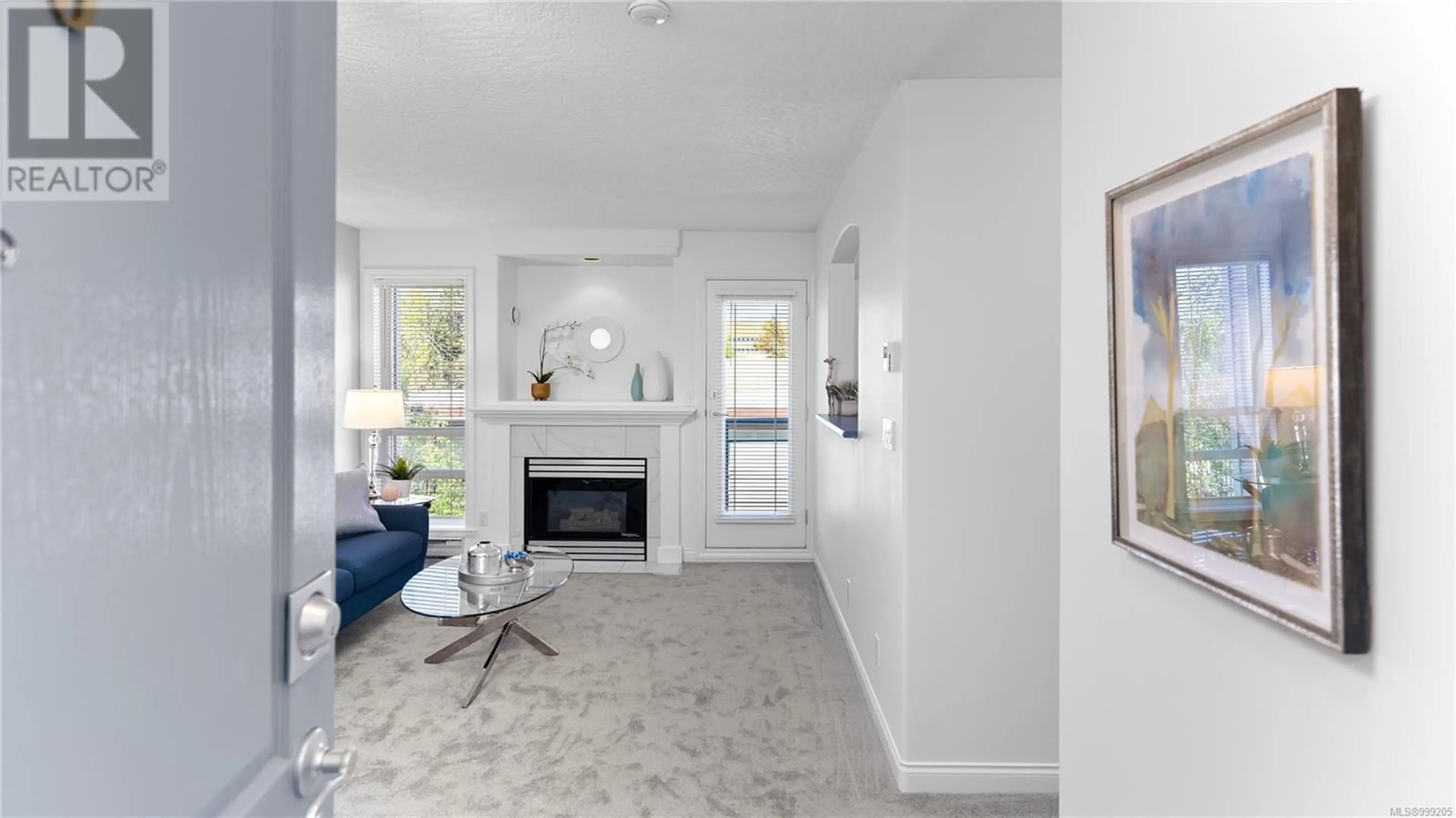 Living room with furniture, ceramic/tile floor for 405 - 2310 TRENT STREET, Victoria British Columbia V8R1K3