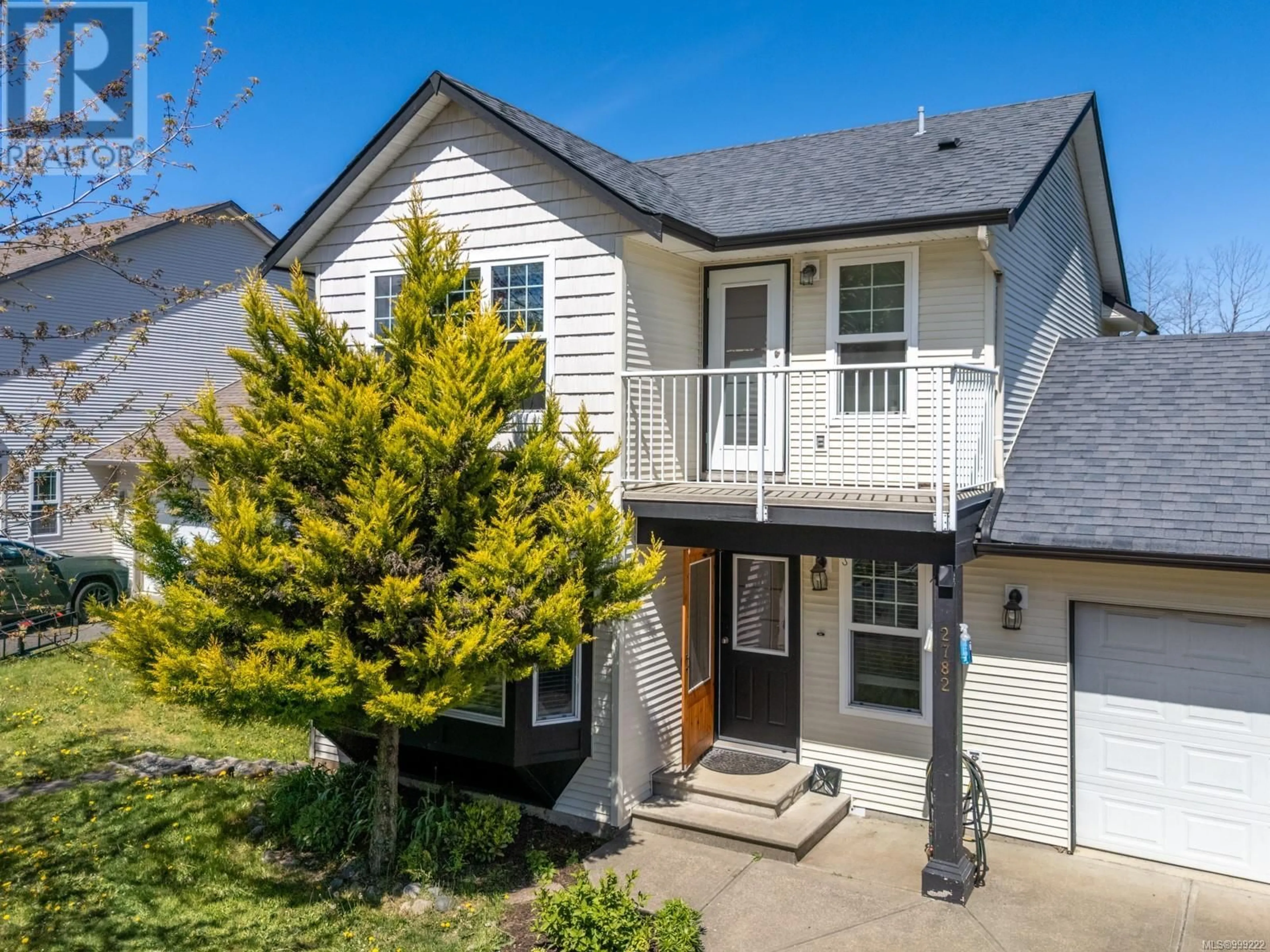 Home with vinyl exterior material, street for 2782 KENDAL AVENUE, Cumberland British Columbia V0R1S0
