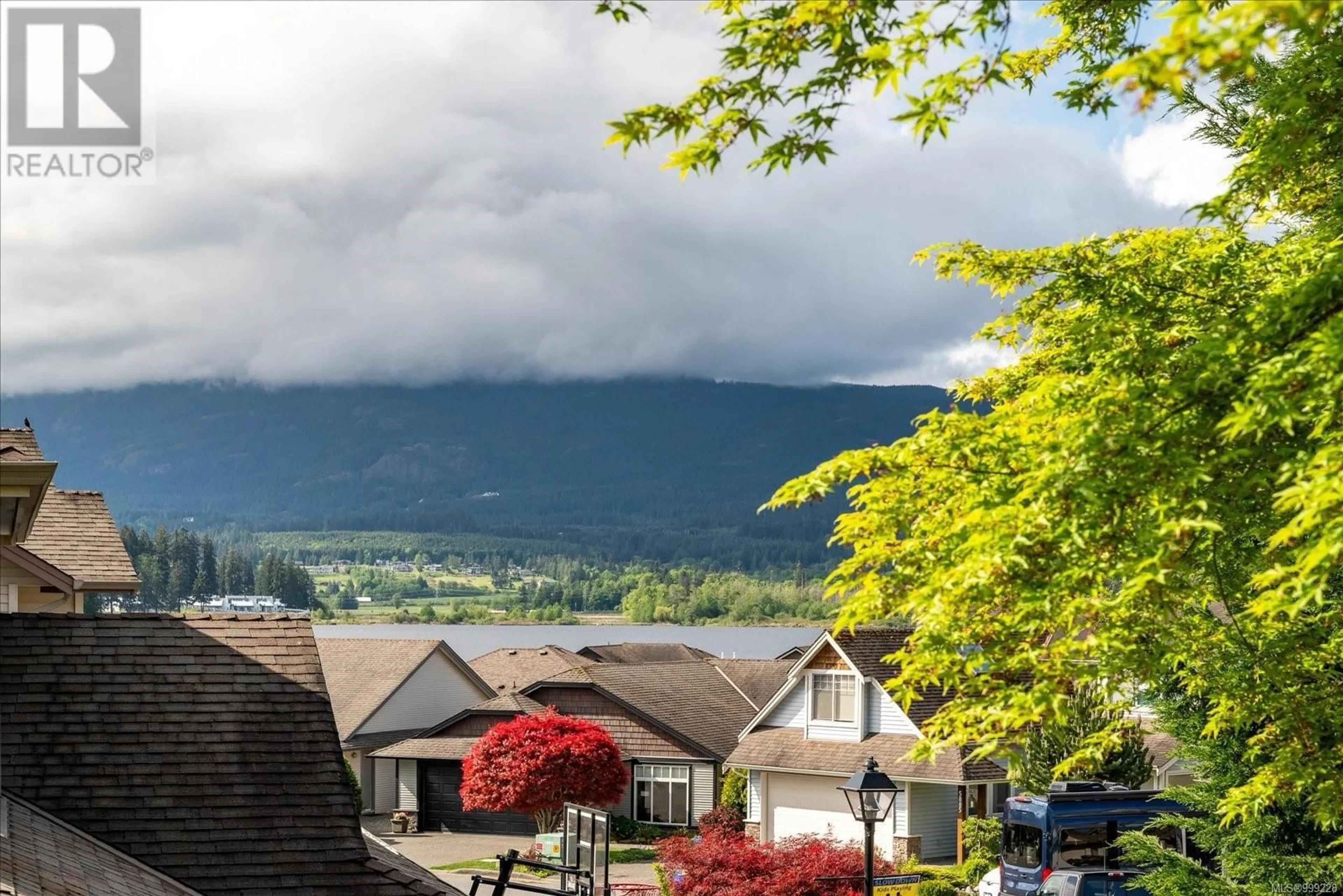 A pic from outside/outdoor area/front of a property/back of a property/a pic from drone, mountain view for 6249 GARSIDE ROAD, Nanaimo British Columbia V9T6H9