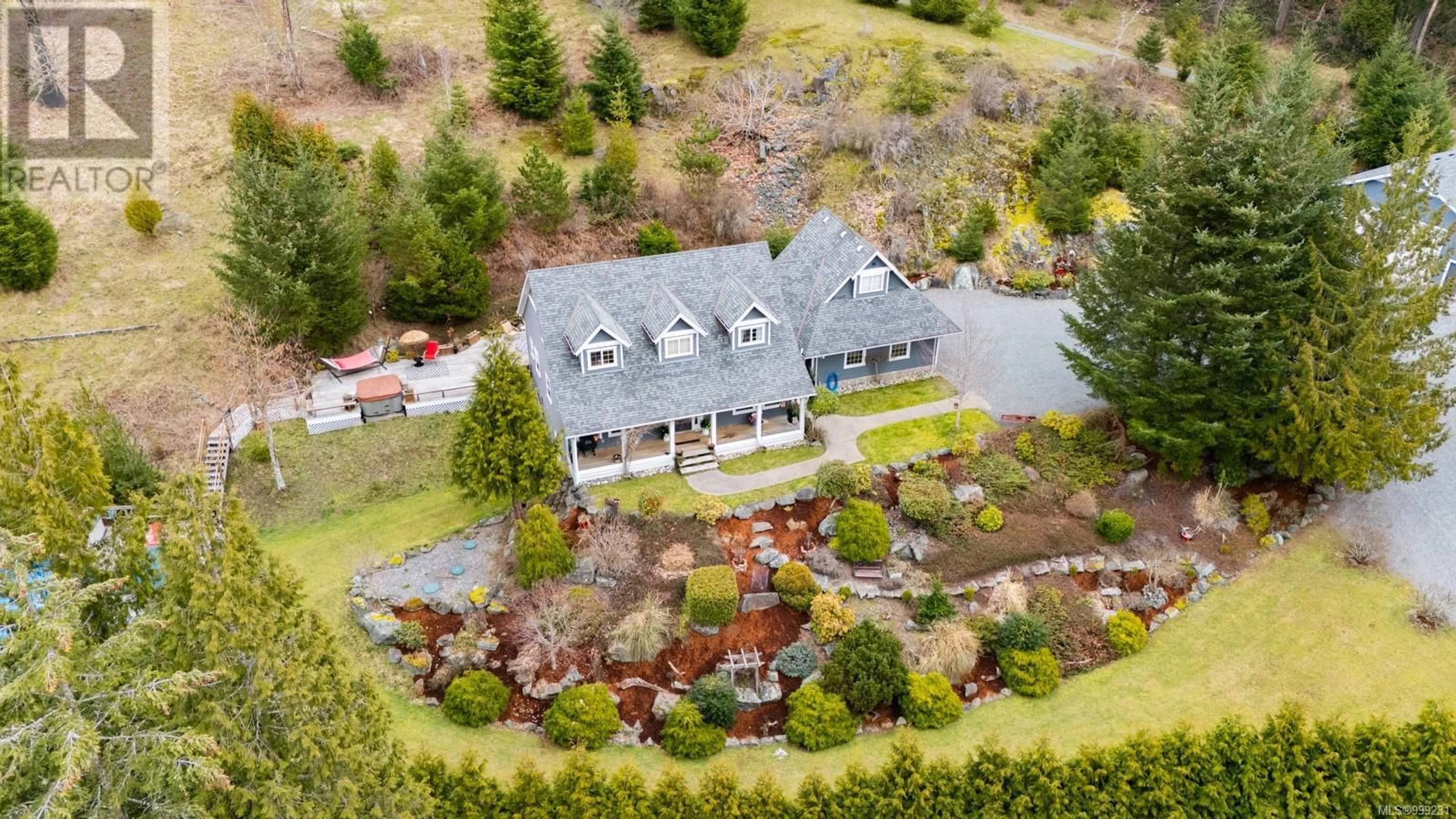 A pic from outside/outdoor area/front of a property/back of a property/a pic from drone, mountain view for 1591 ESCARPMENT WAY, Duncan British Columbia V9L5W7