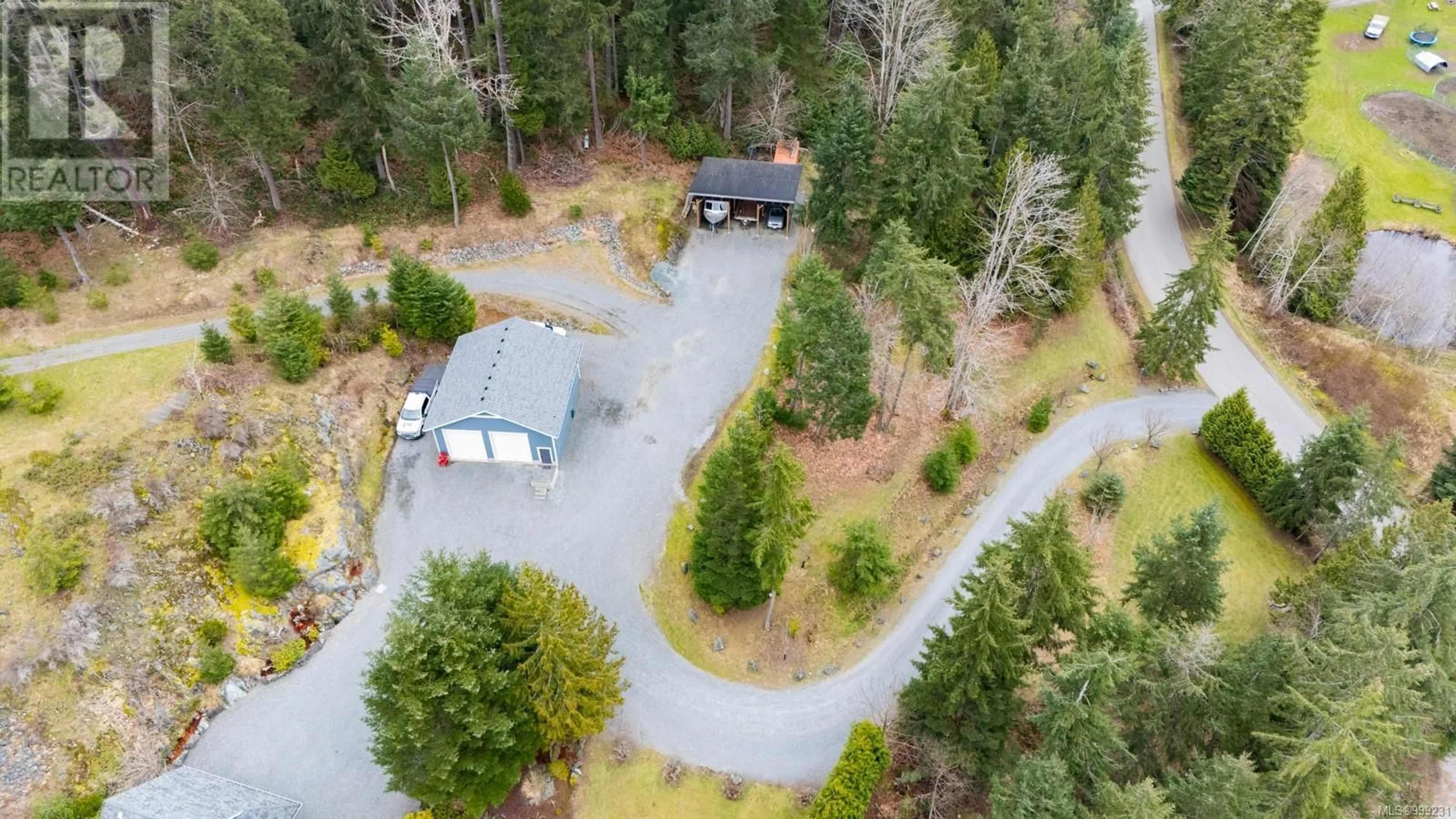 A pic from outside/outdoor area/front of a property/back of a property/a pic from drone, forest/trees view for 1591 ESCARPMENT WAY, Duncan British Columbia V9L5W7