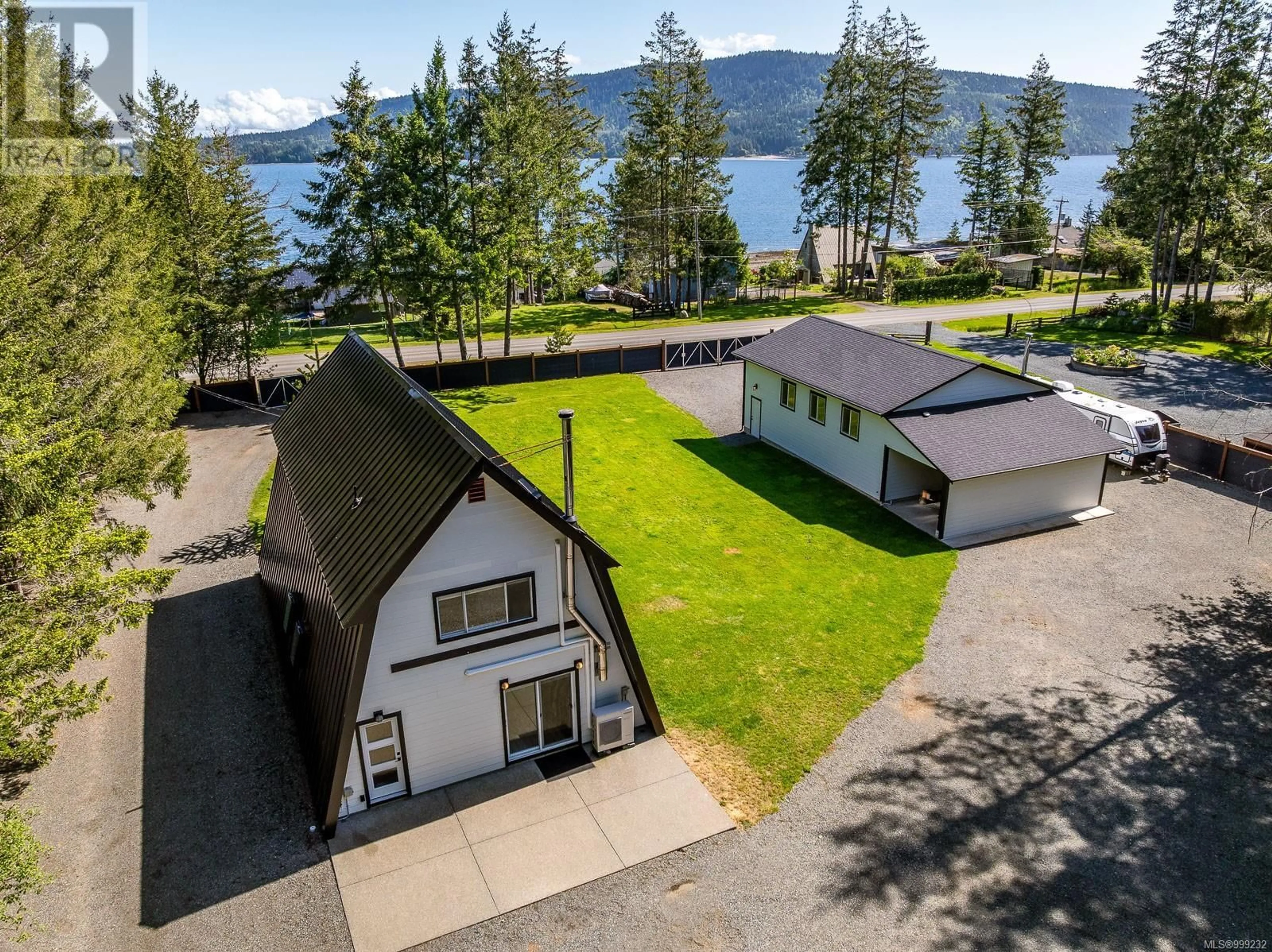 A pic from outside/outdoor area/front of a property/back of a property/a pic from drone, water/lake/river/ocean view for 3849 EAST ROAD, Denman Island British Columbia V0R1T0