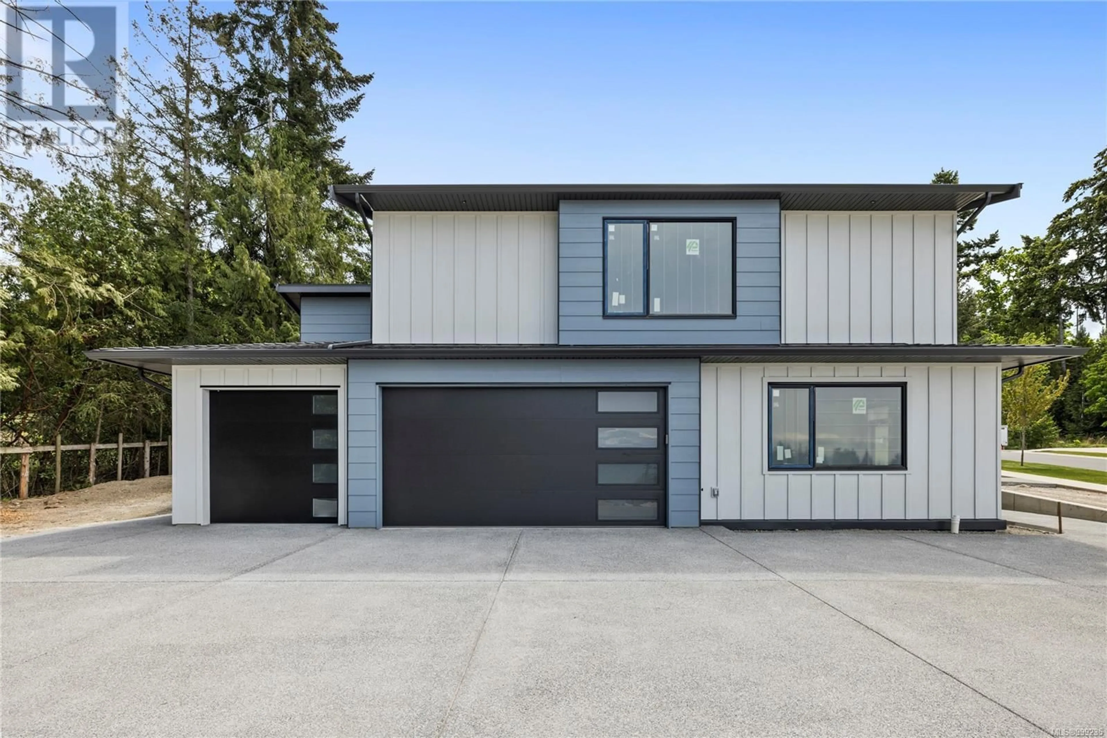Home with vinyl exterior material, street for 6920 SHALE ROAD, Lantzville British Columbia V0R2H0