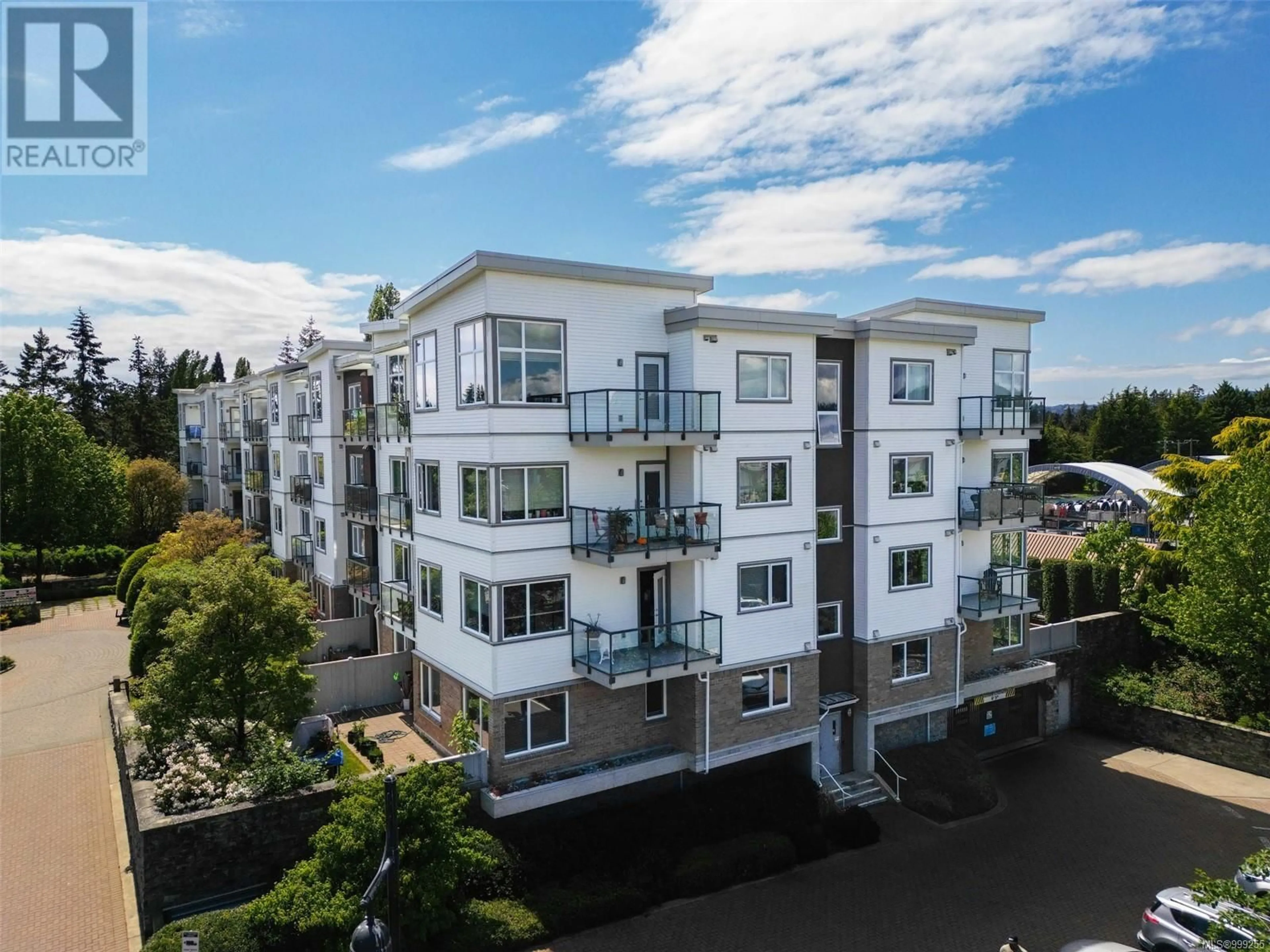 A pic from outside/outdoor area/front of a property/back of a property/a pic from drone, unknown for 304 - 4394 WEST SAANICH ROAD, Saanich British Columbia V8Z0B5