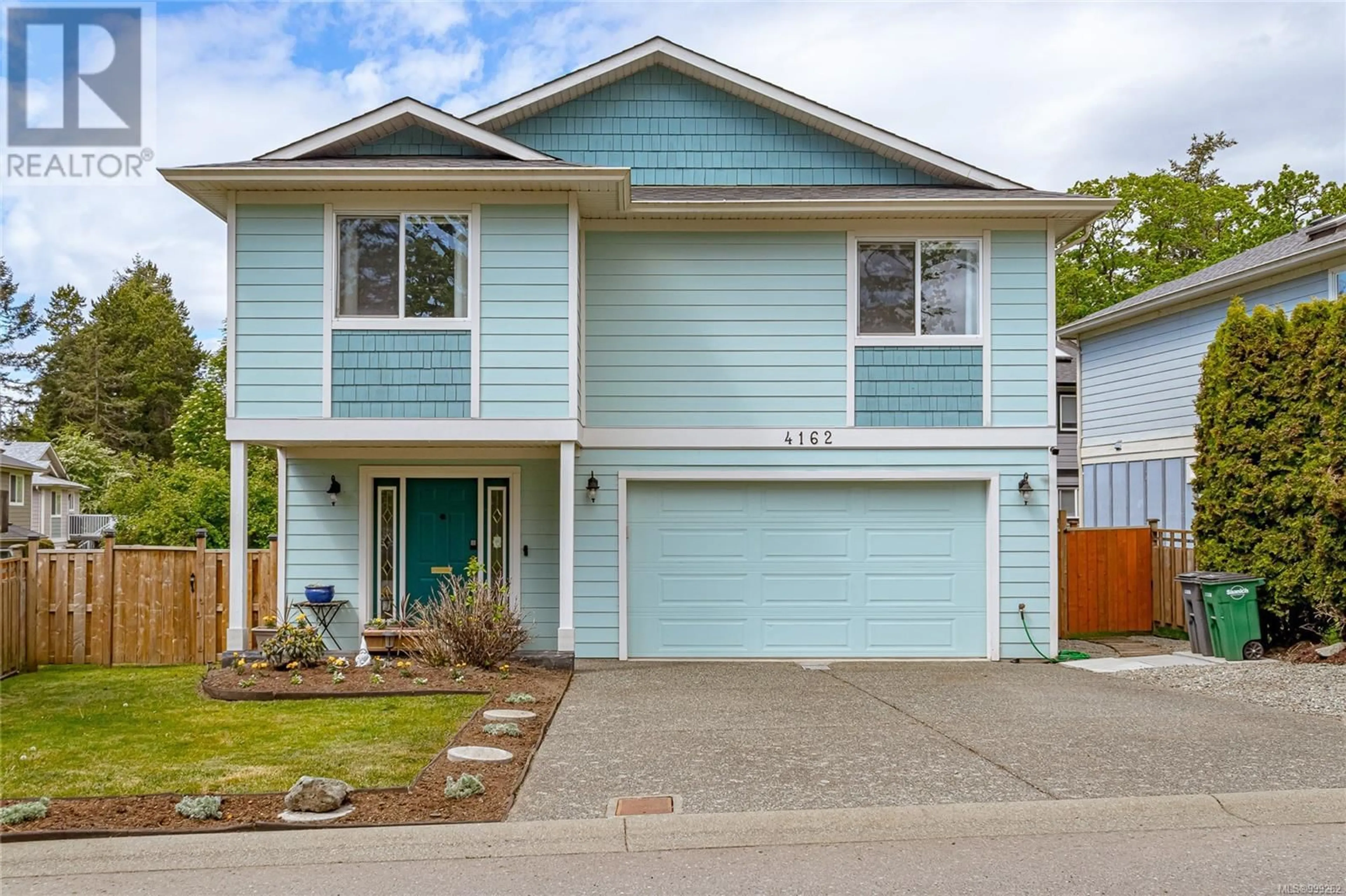 Home with vinyl exterior material, street for 4162 ROCKHOME GARDENS, Saanich British Columbia V8X5K4