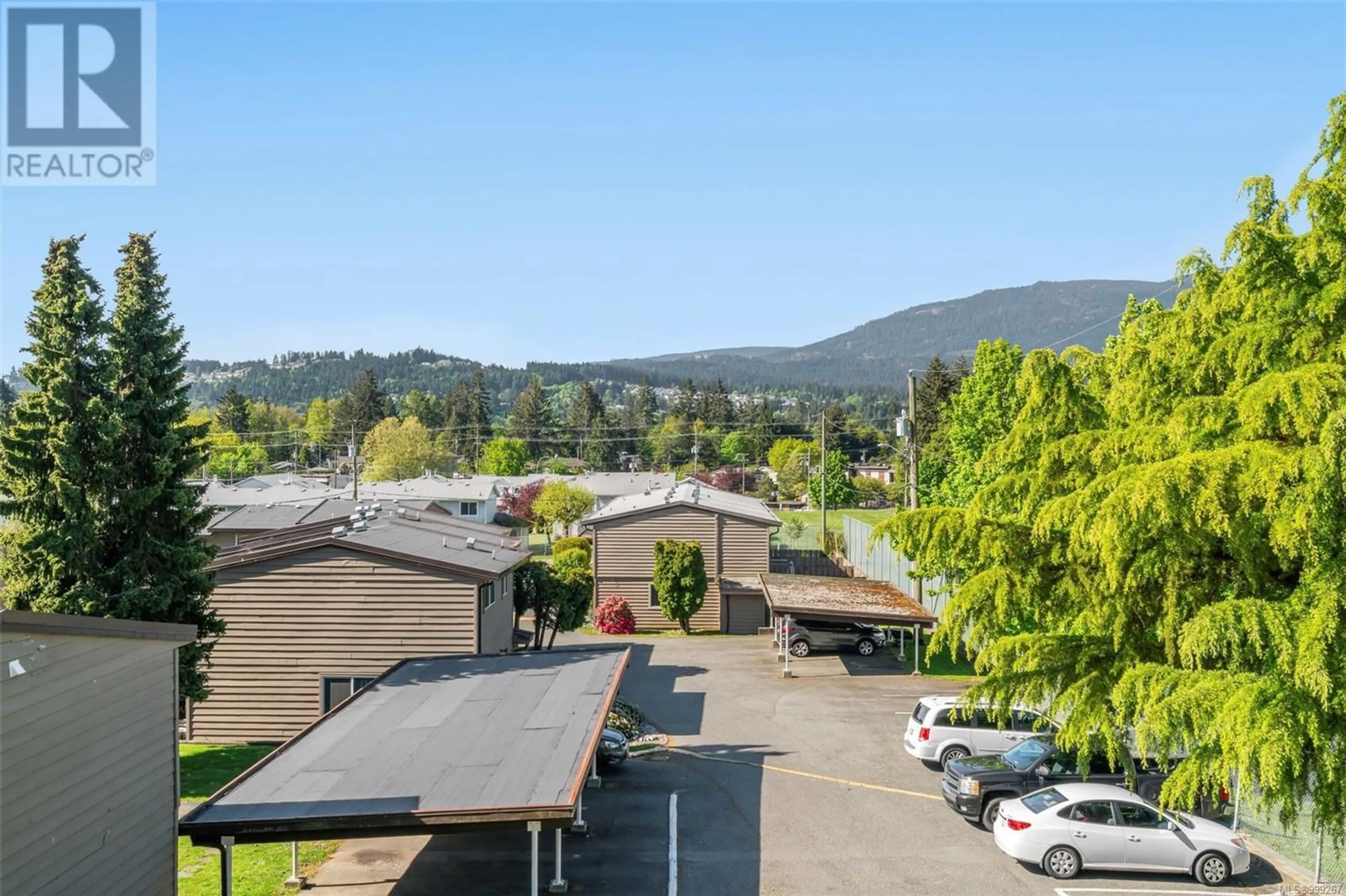 A pic from outside/outdoor area/front of a property/back of a property/a pic from drone, mountain view for 8 - 25 PRYDE AVENUE, Nanaimo British Columbia