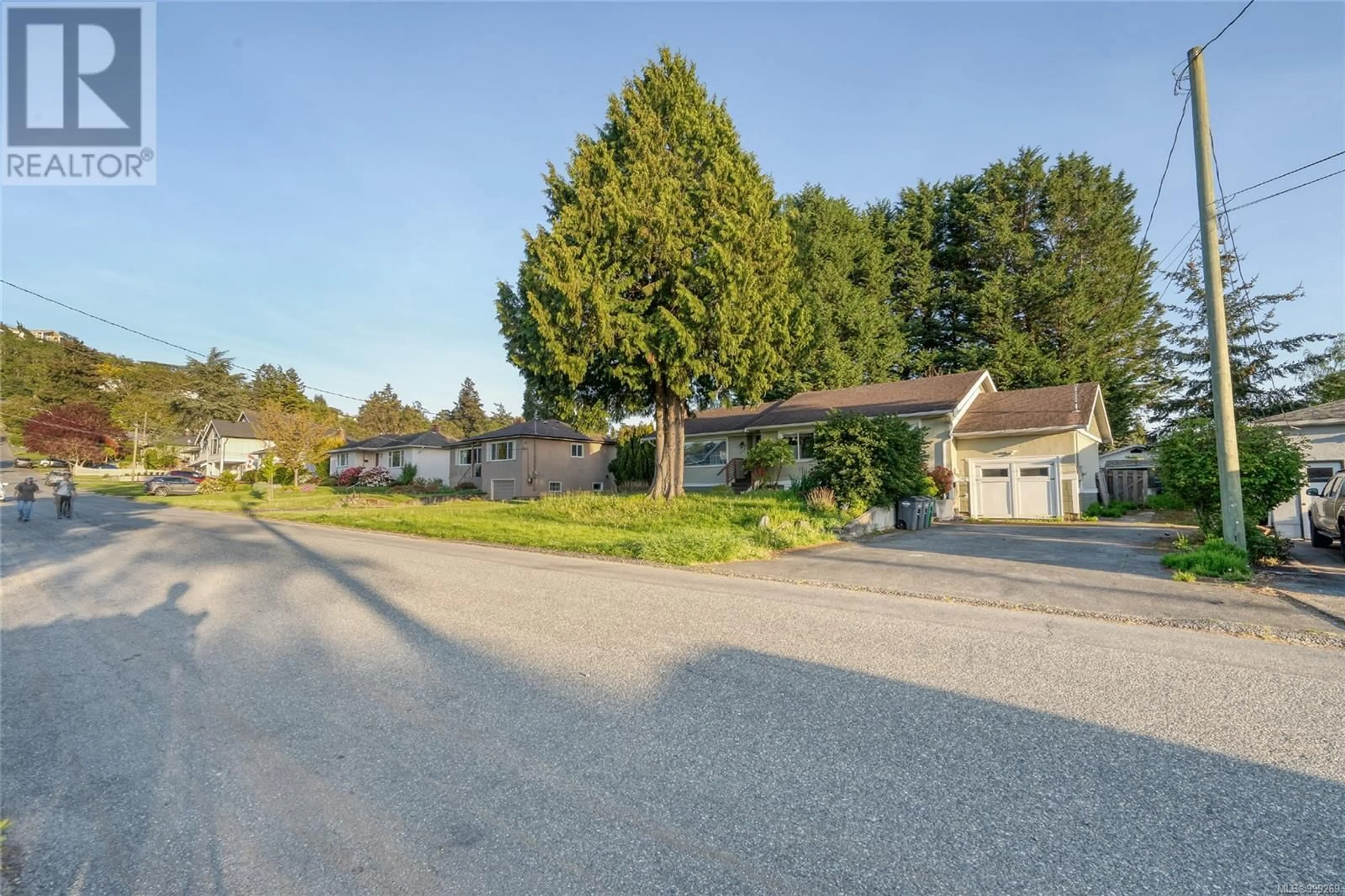 A pic from outside/outdoor area/front of a property/back of a property/a pic from drone, street for 1679 CEDAR AVENUE, Saanich British Columbia V8P1X1