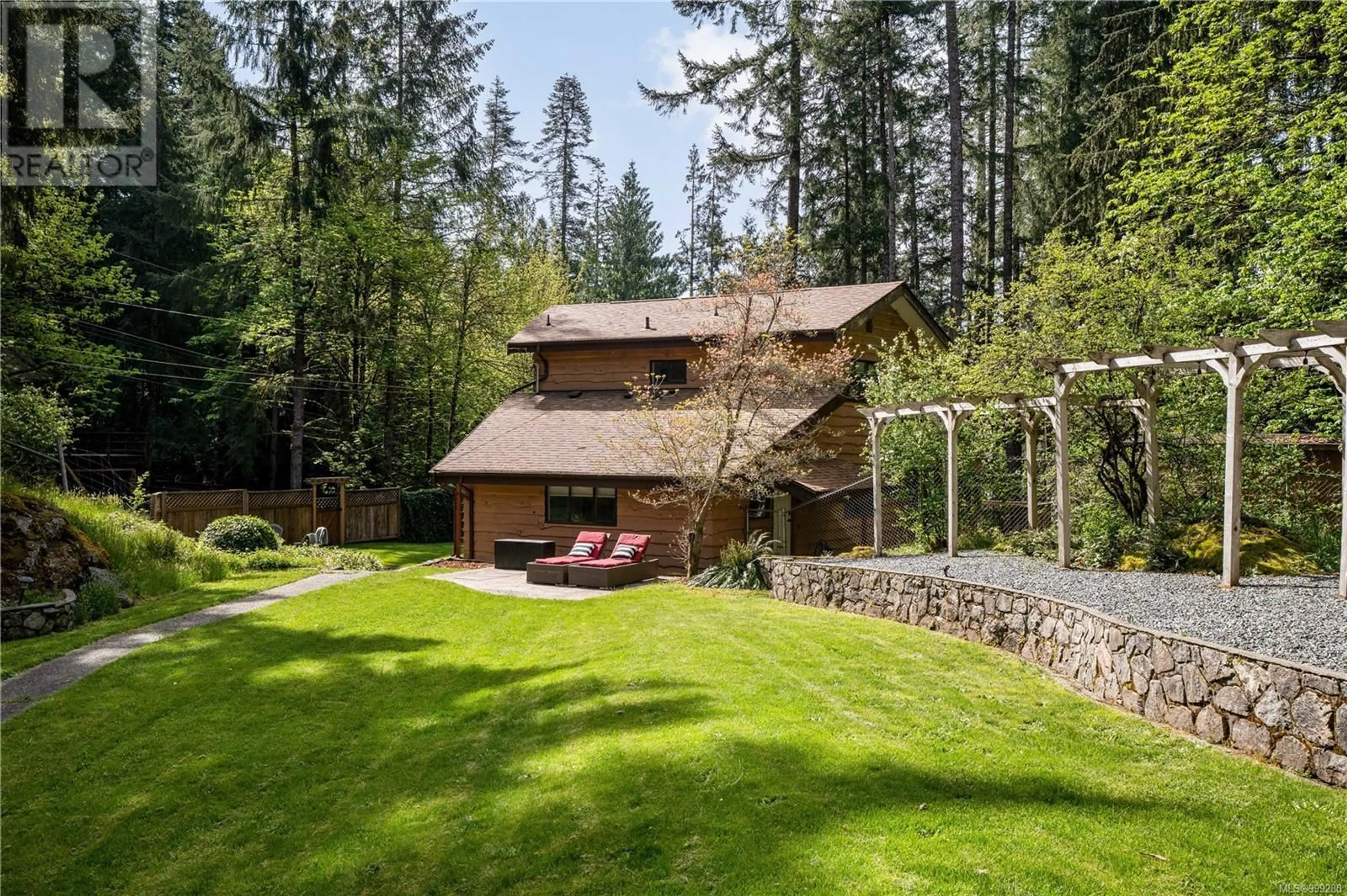 A pic from outside/outdoor area/front of a property/back of a property/a pic from drone, forest/trees view for 2446 SOMMER LANE, Shawnigan Lake British Columbia V0R2W1