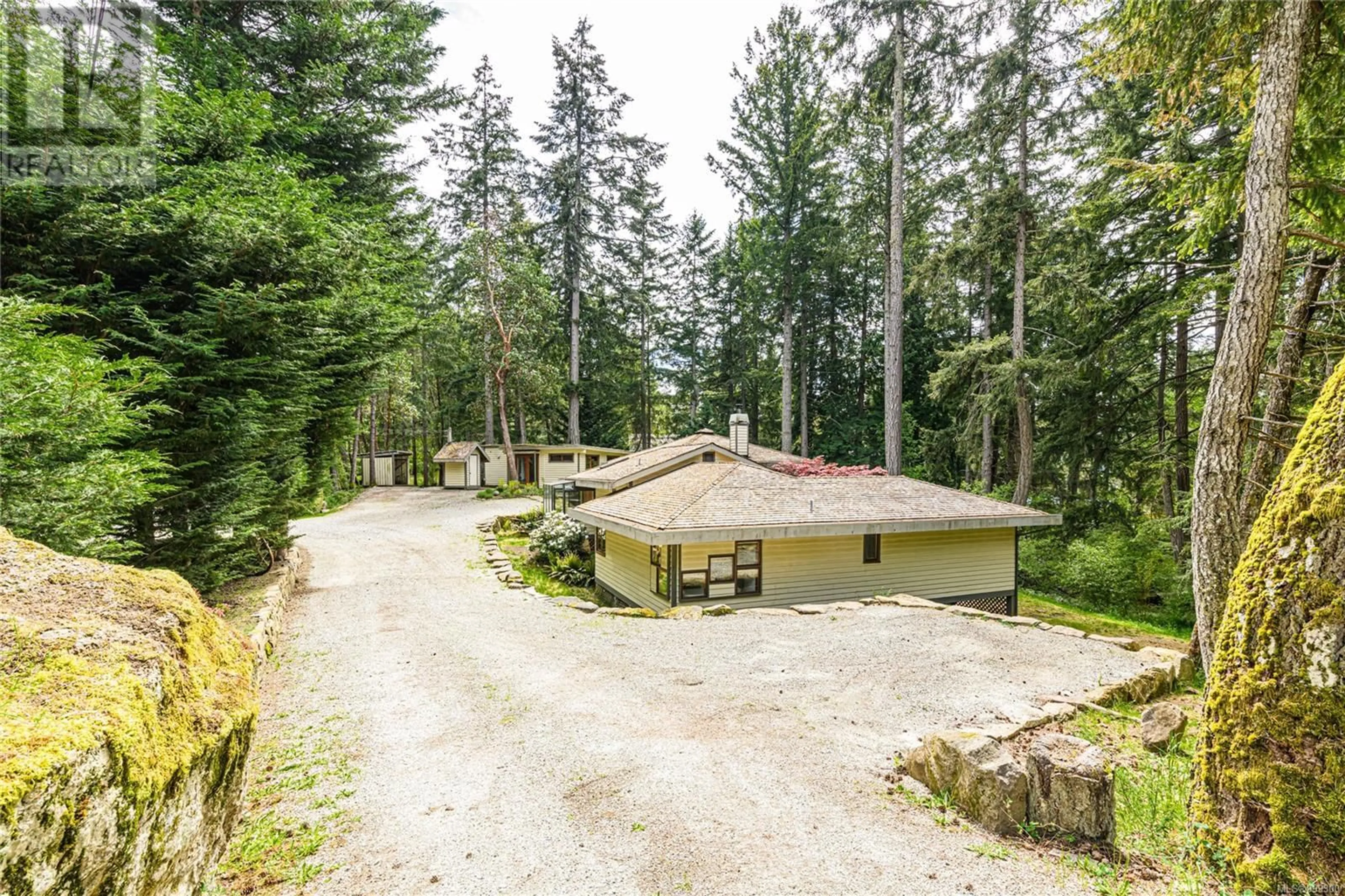 A pic from outside/outdoor area/front of a property/back of a property/a pic from drone, forest/trees view for 175 LAWNHILL DRIVE, Salt Spring British Columbia V8K1M9