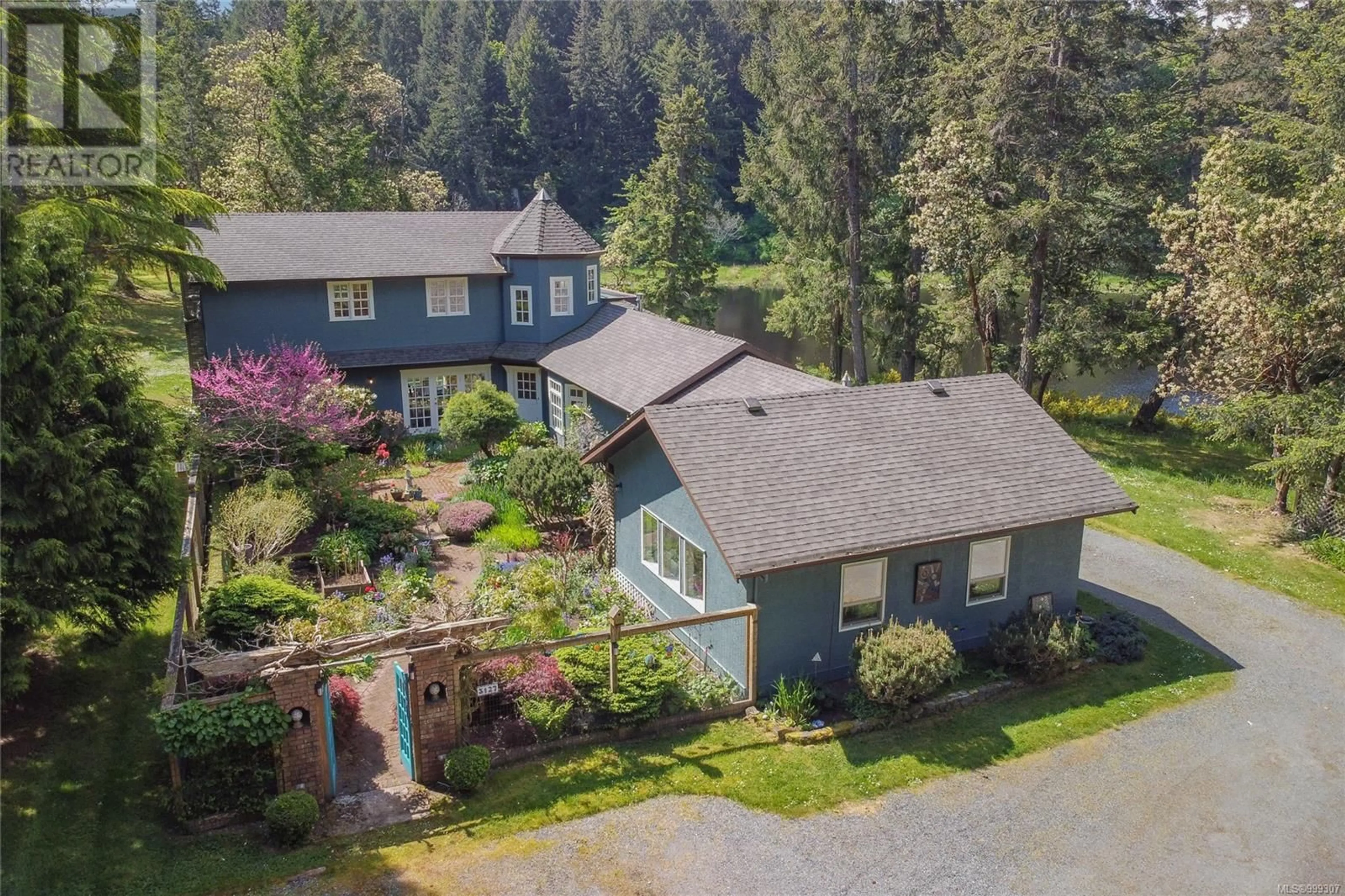 A pic from outside/outdoor area/front of a property/back of a property/a pic from drone, unknown for 3127 INGRAM ROAD, Nanaimo British Columbia V9X1W8