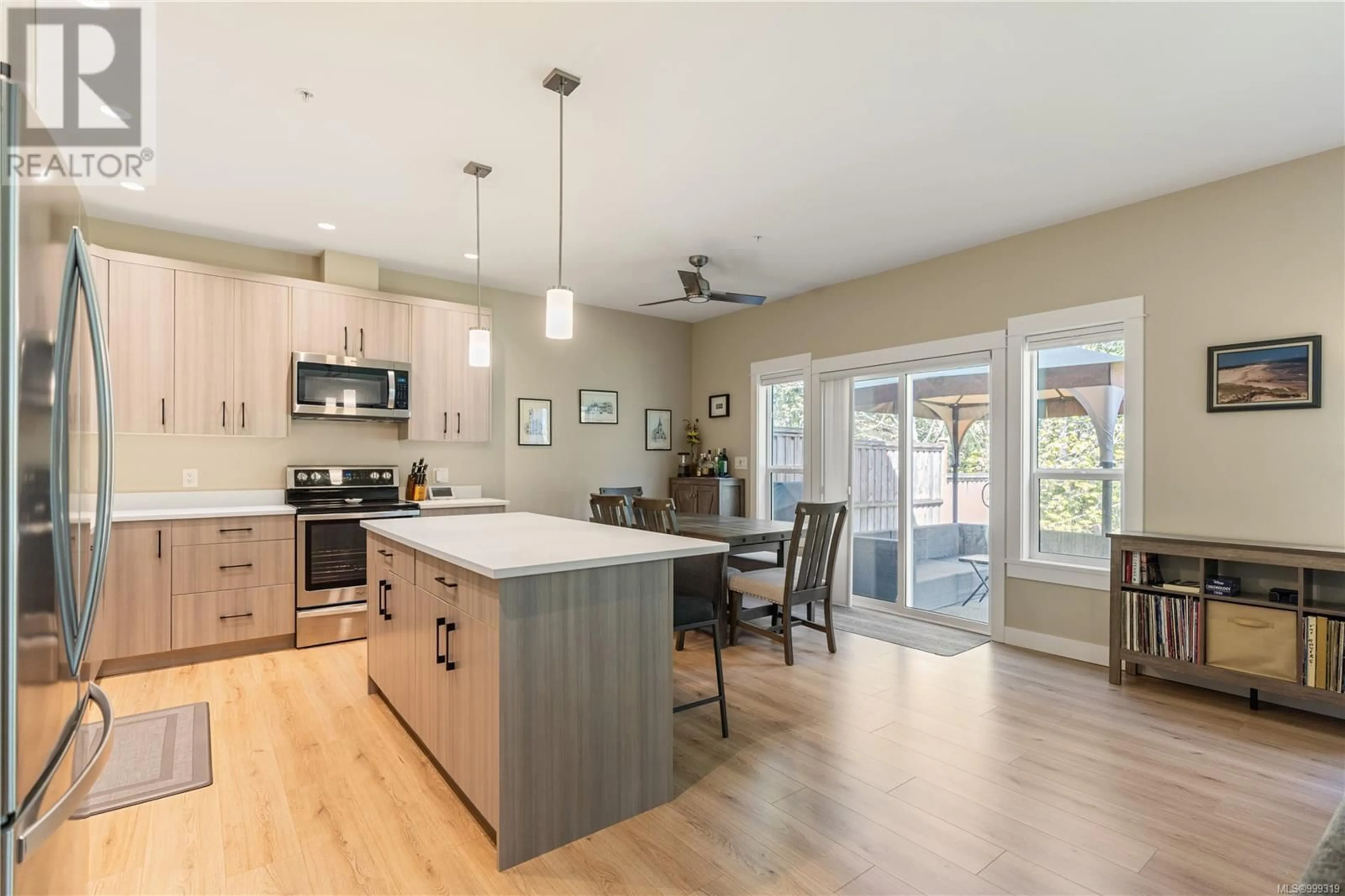 Open concept kitchen, wood/laminate floor for 1939 WEST PARK LANE, View Royal British Columbia V9B3R9