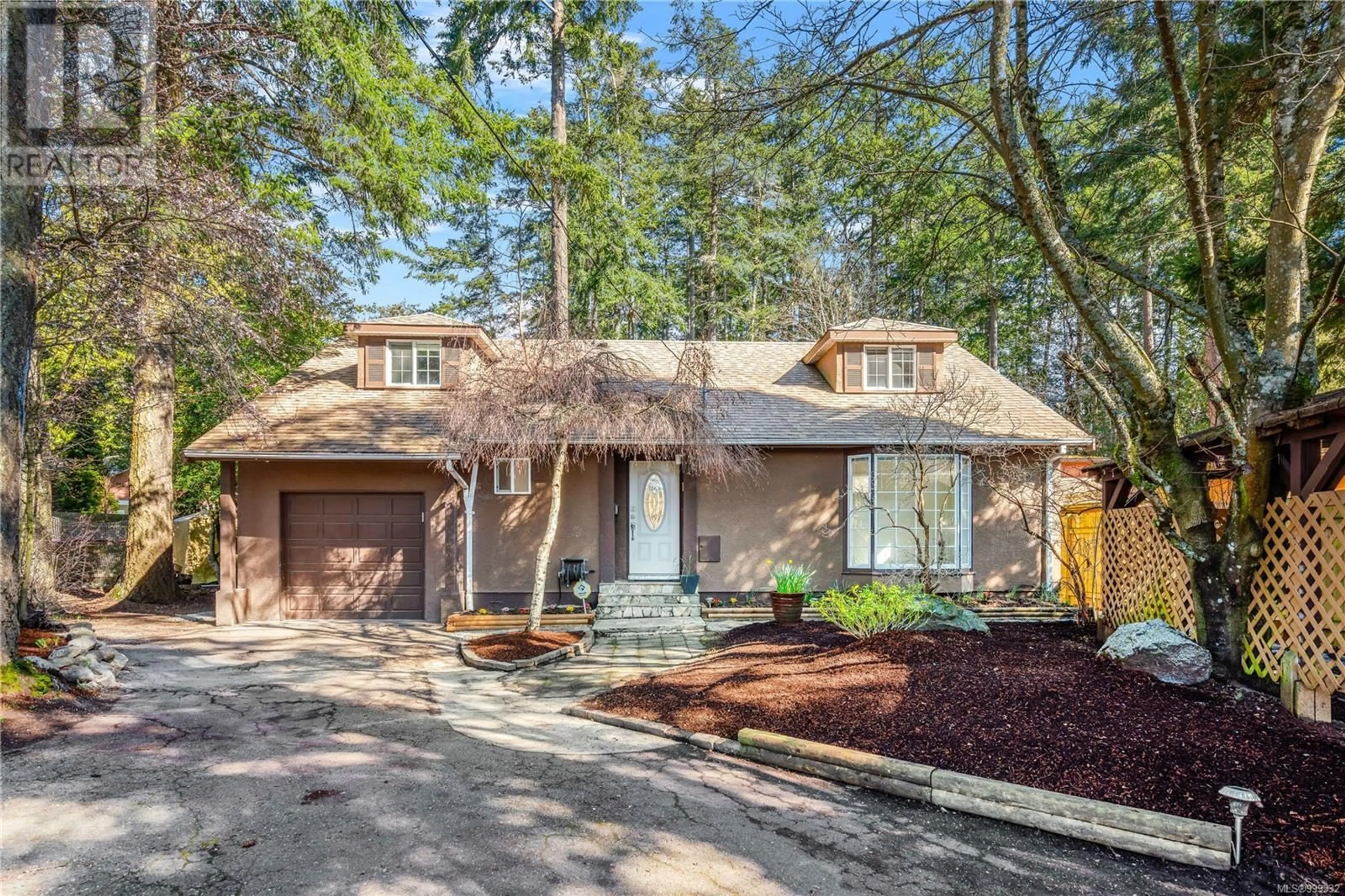 Home with brick exterior material, street for 4815 CORDOVA BAY ROAD, Saanich British Columbia V8Y2J8