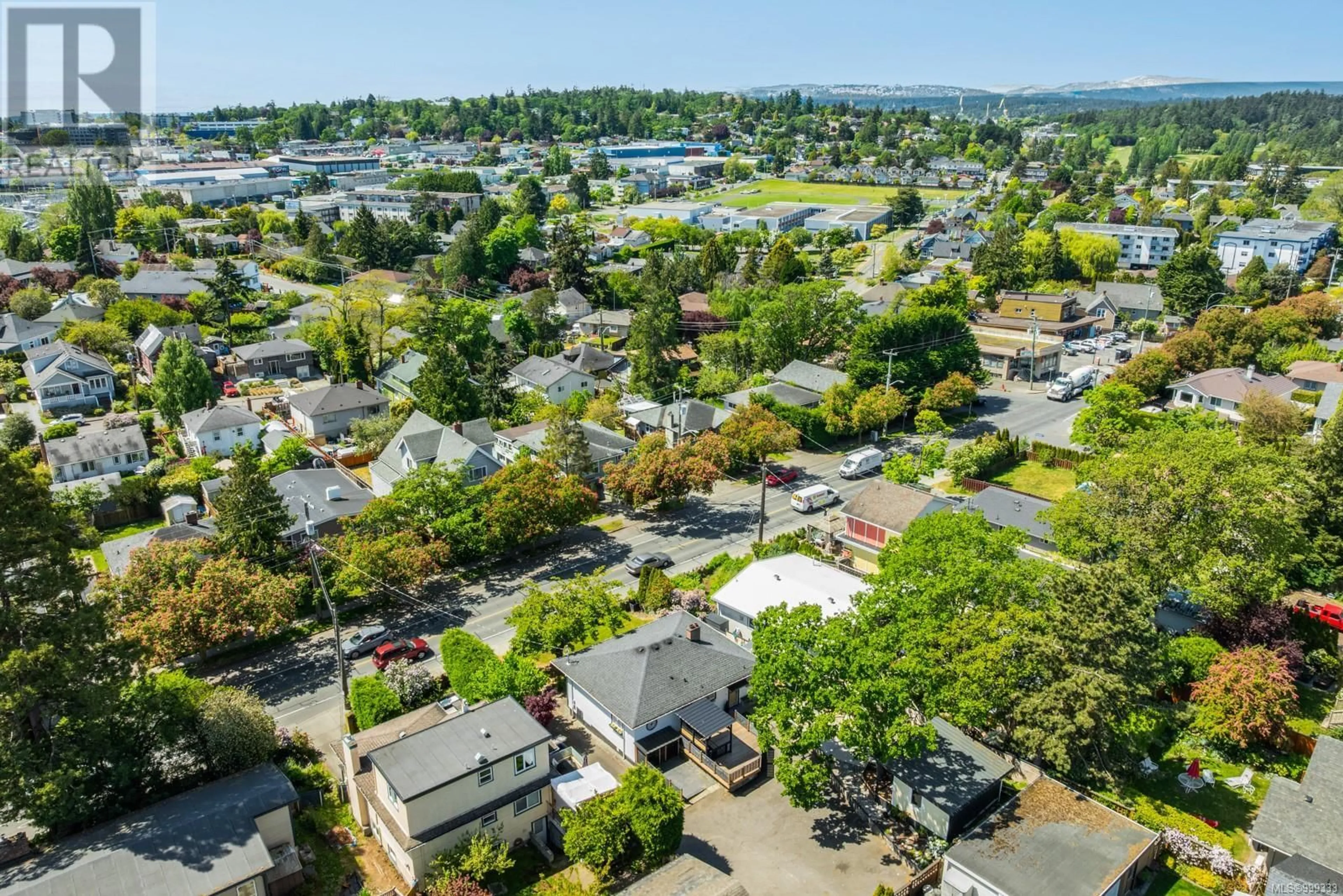 A pic from outside/outdoor area/front of a property/back of a property/a pic from drone, street for 727 CRAIGFLOWER ROAD, Victoria British Columbia V9A2W6