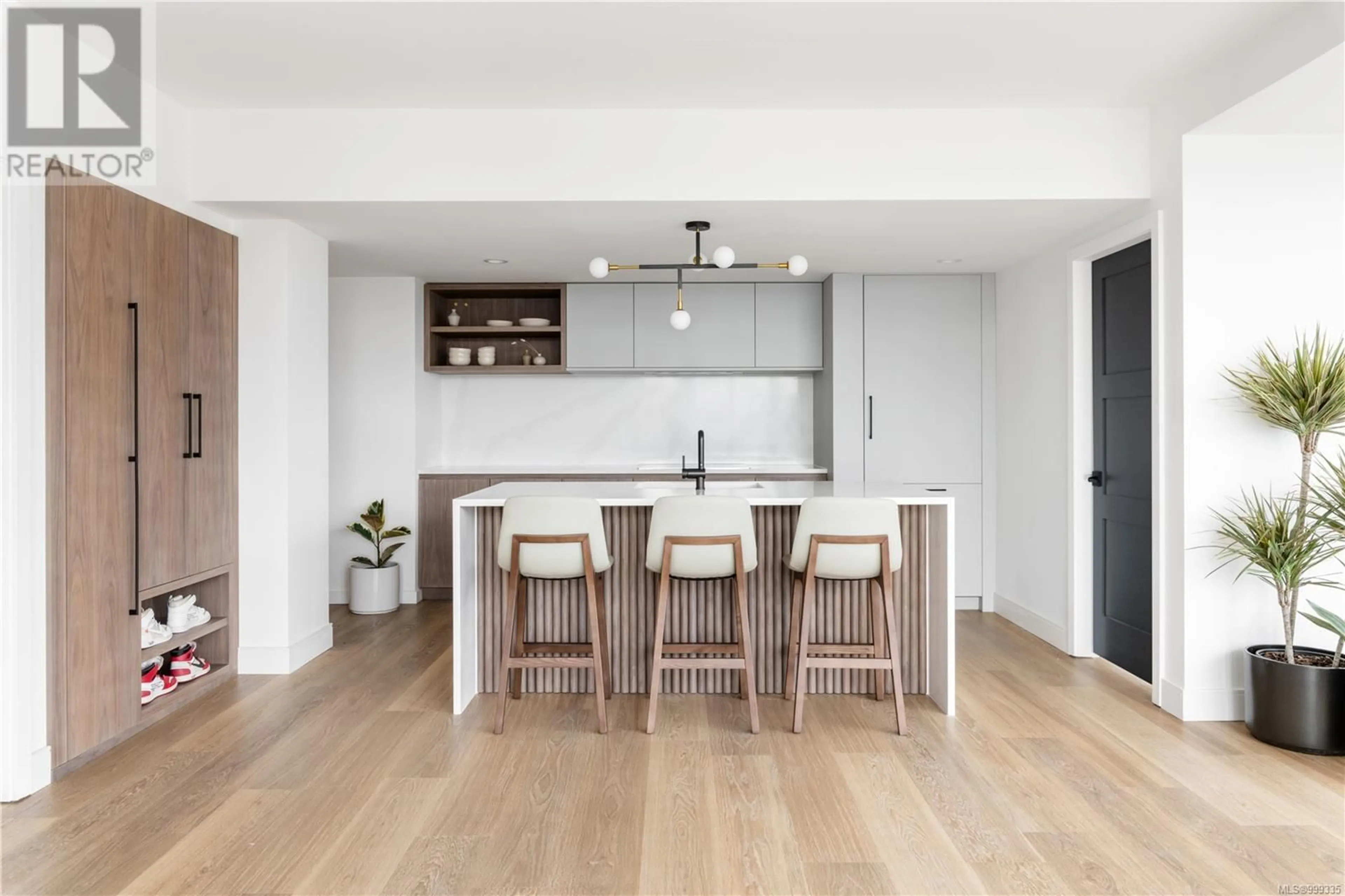 Open concept kitchen, wood/laminate floor for 901 - 760 JOHNSON STREET, Victoria British Columbia V8W1N1