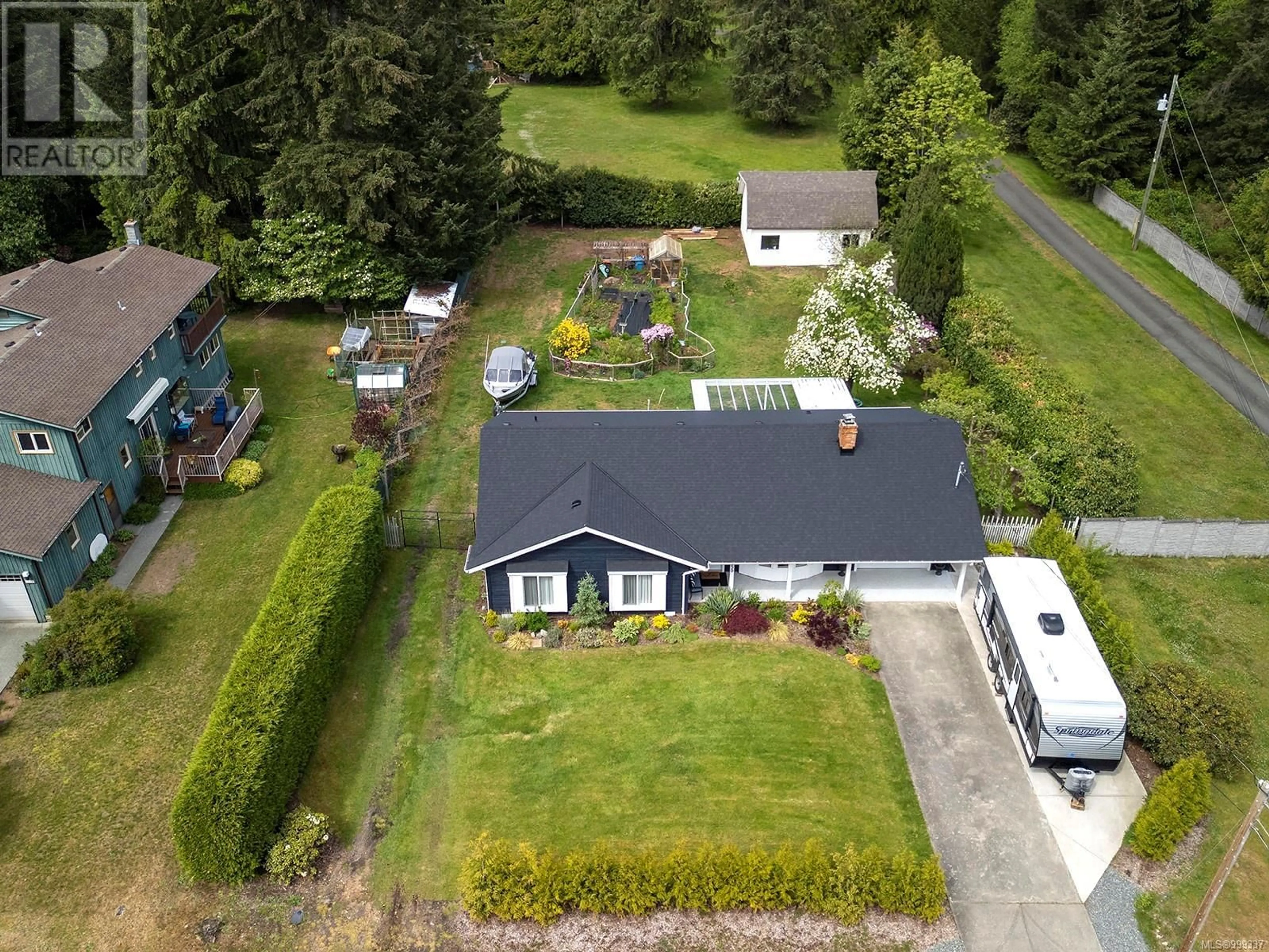 A pic from outside/outdoor area/front of a property/back of a property/a pic from drone, unknown for 2250 IDIENS WAY, Comox British Columbia V9M3Y9