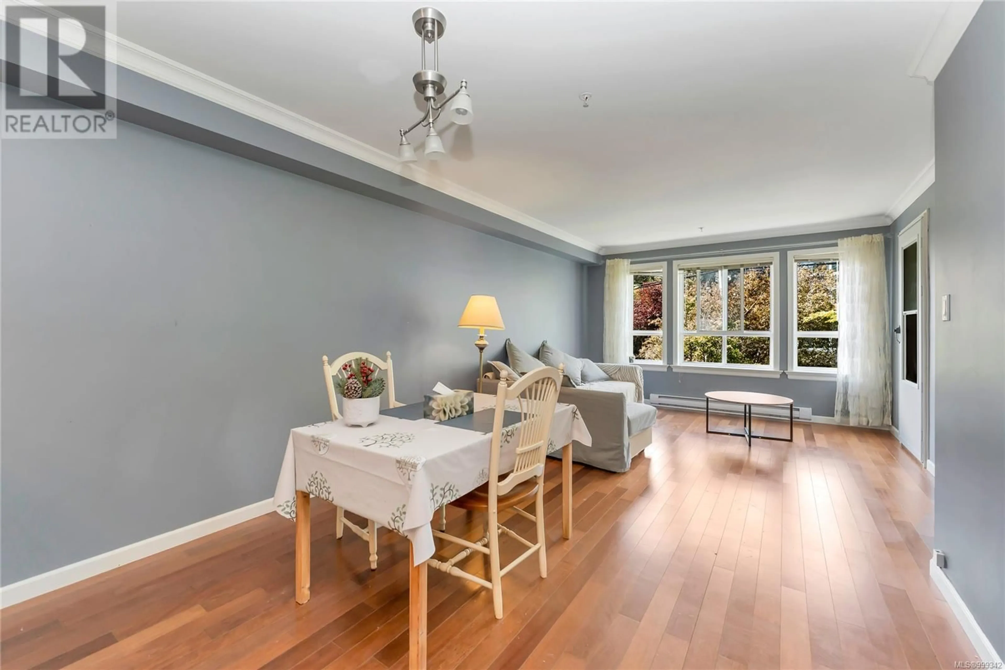 Dining room, wood/laminate floor for 203 - 1514 CHURCH AVENUE, Saanich British Columbia V8P0A3